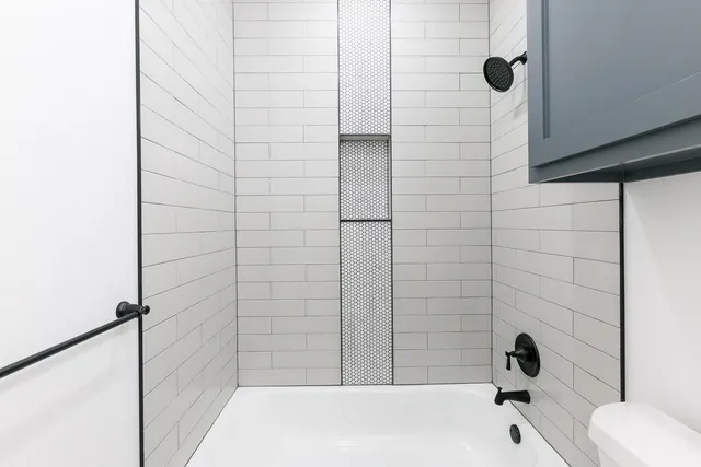 a bathroom with a bathtub