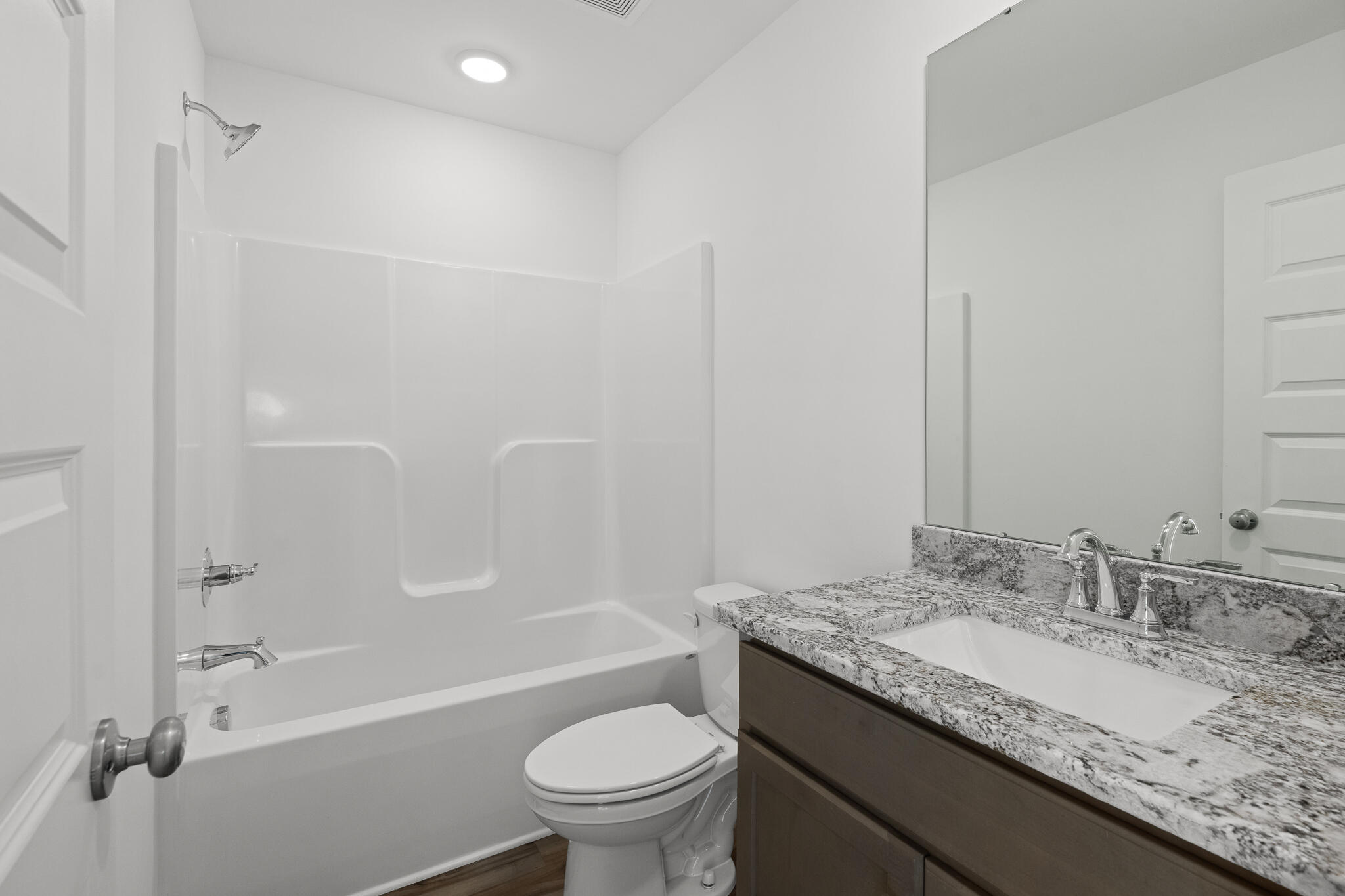 Lot 14 Clarke Hill Road Freeport, FL 32439 - Photo 29 of 58 a bathroom with a granite countertop sink toilet and shower