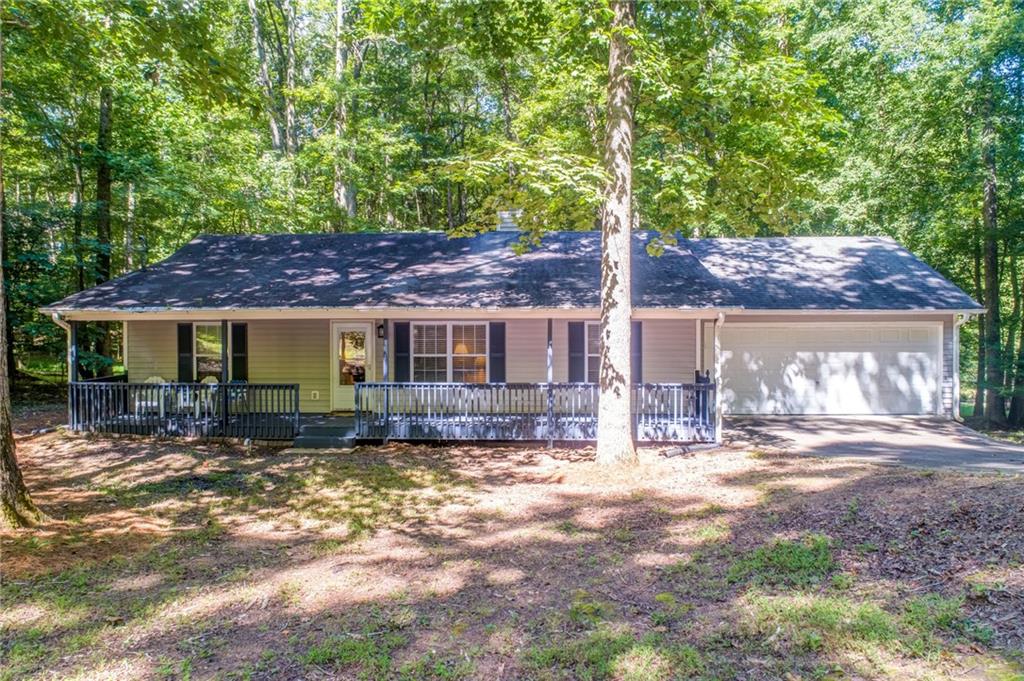 Desirable Ranch with Rocking Chair Front Porch