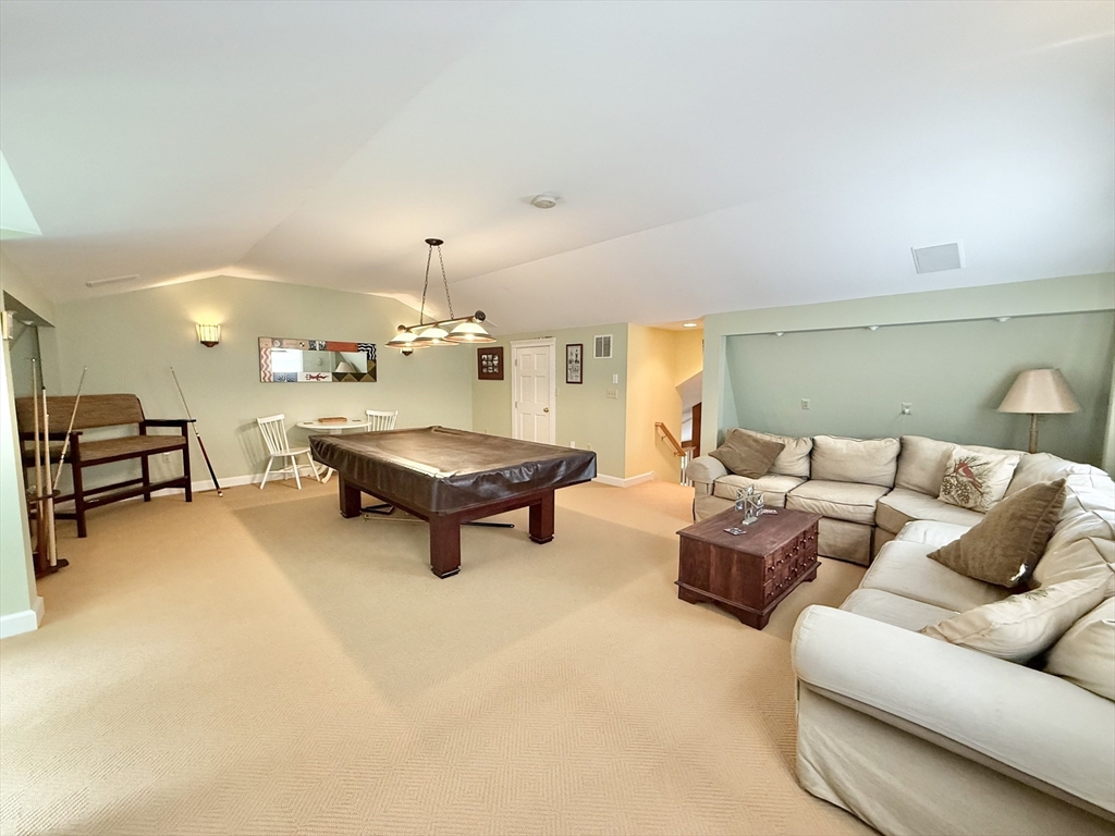 95 Ball Road Goshen, MA 01032 - Photo 20 of 33 a living room with furniture and a table