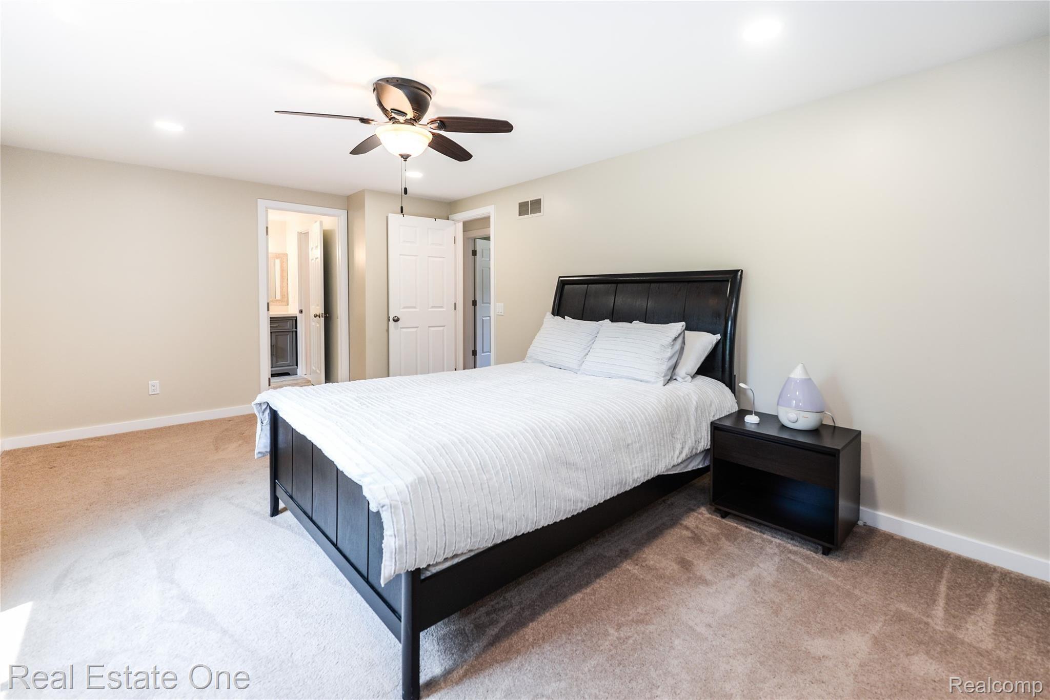 3007 Shewbird Road Wixom, MI 48393 - Photo 16 of 48 Master bedroom as access to main bath