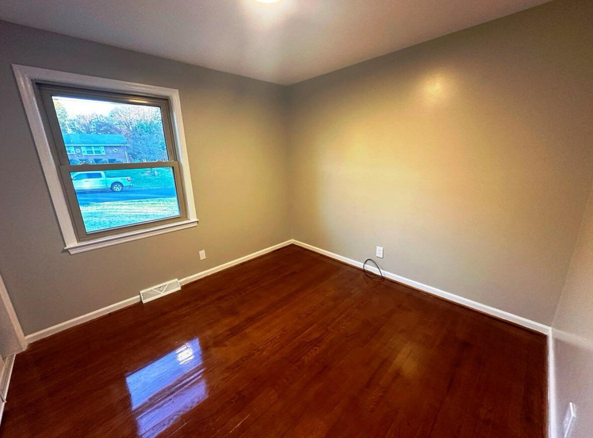 303 Swain Drive Danville, VA 24540 - Photo 13 of 24 a view of an empty room and window