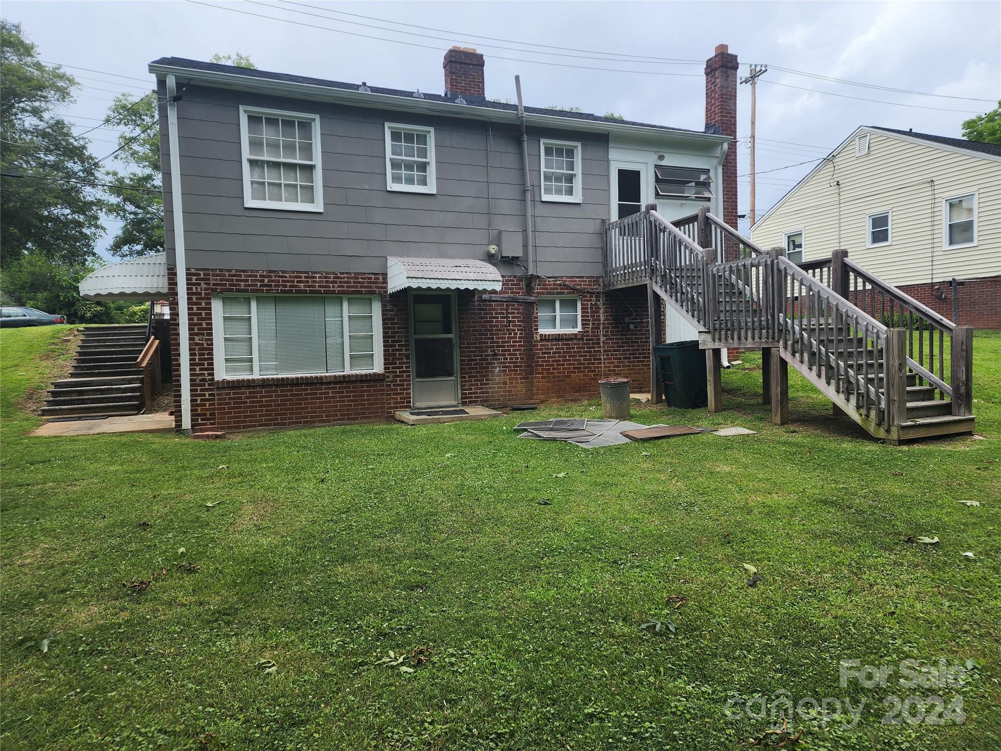 474 Hope Street Rock Hill, SC 29730 - Photo 12 of 18 a view of a house with a yard and a wooden fence