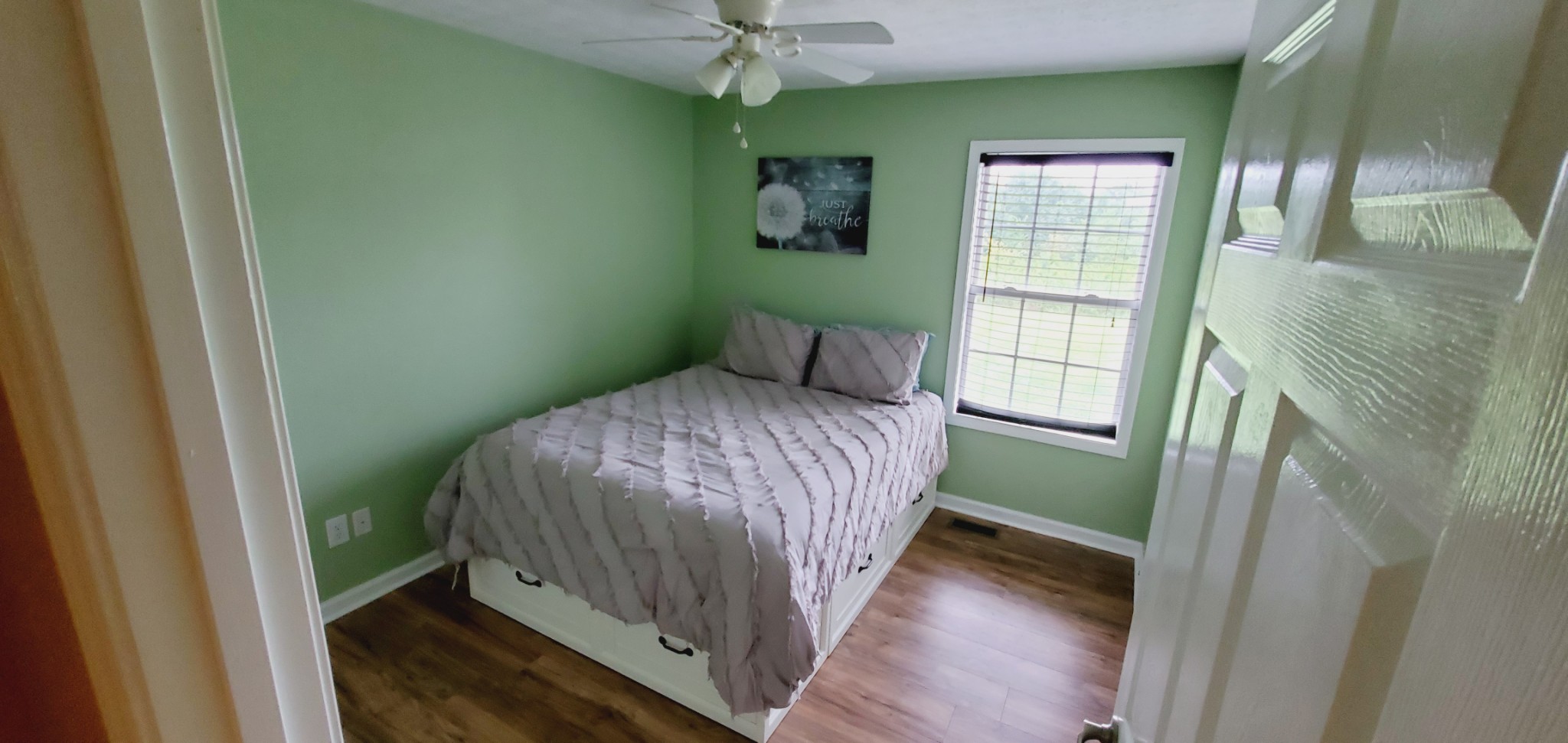 5043 Mt Zion Road Springfield, TN 37172 - Photo 13 of 32 a bedroom with a bed and a window