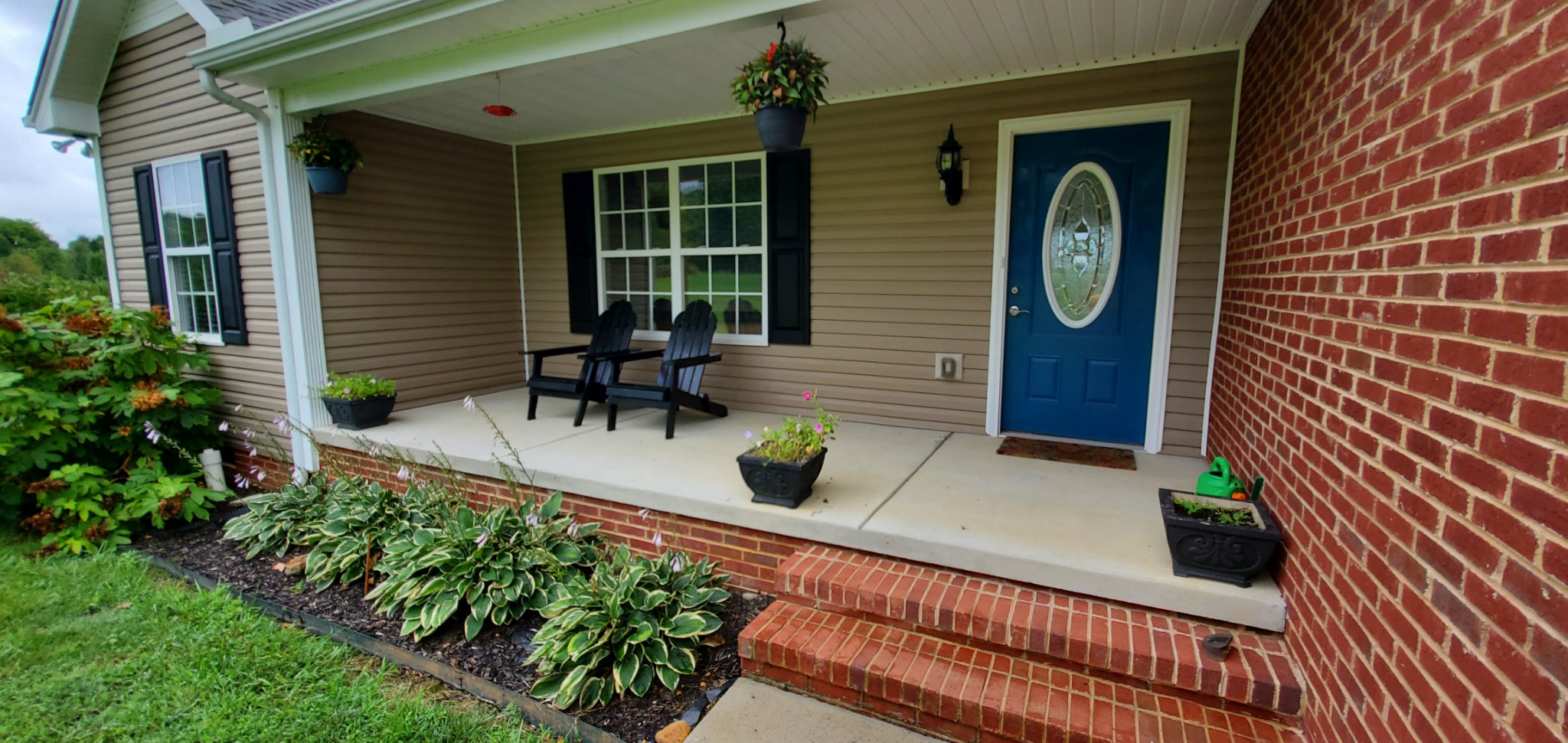 5043 Mt Zion Road Springfield, TN 37172 - Photo 3 of 32 a view of a two chairs in the balcony
