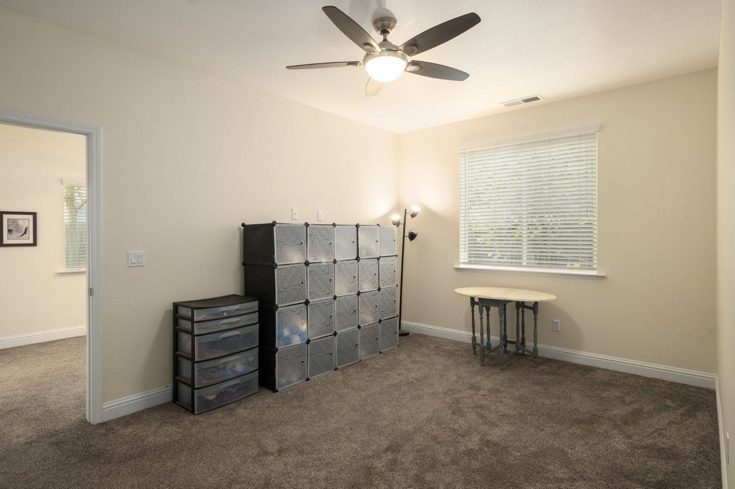 775 South Michelle Avenue Kerman, CA 93630 - Photo 18 of 37 a view of workspace with furniture and window