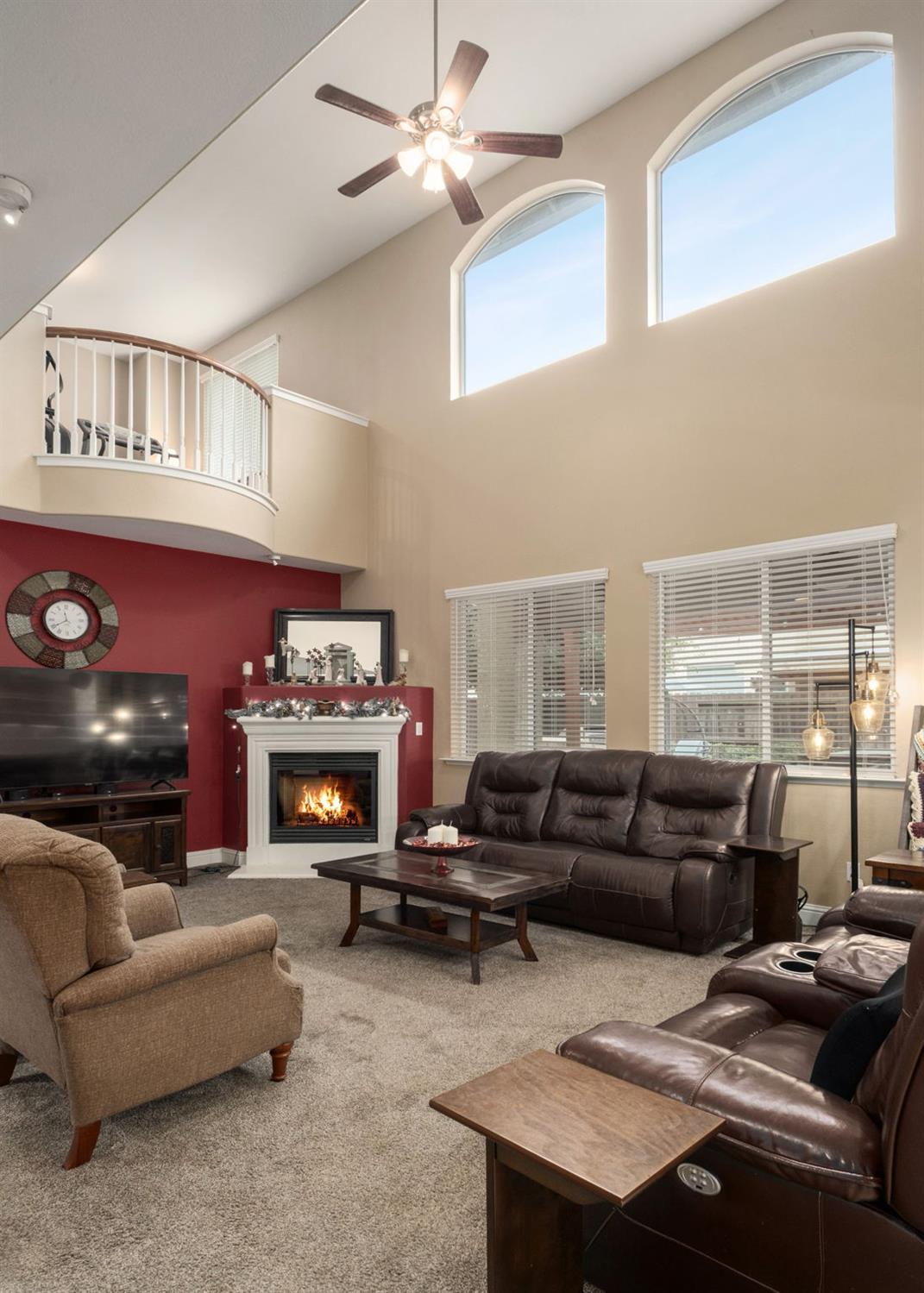 775 South Michelle Avenue Kerman, CA 93630 - Photo 9 of 37 a living room with furniture fireplace and a window