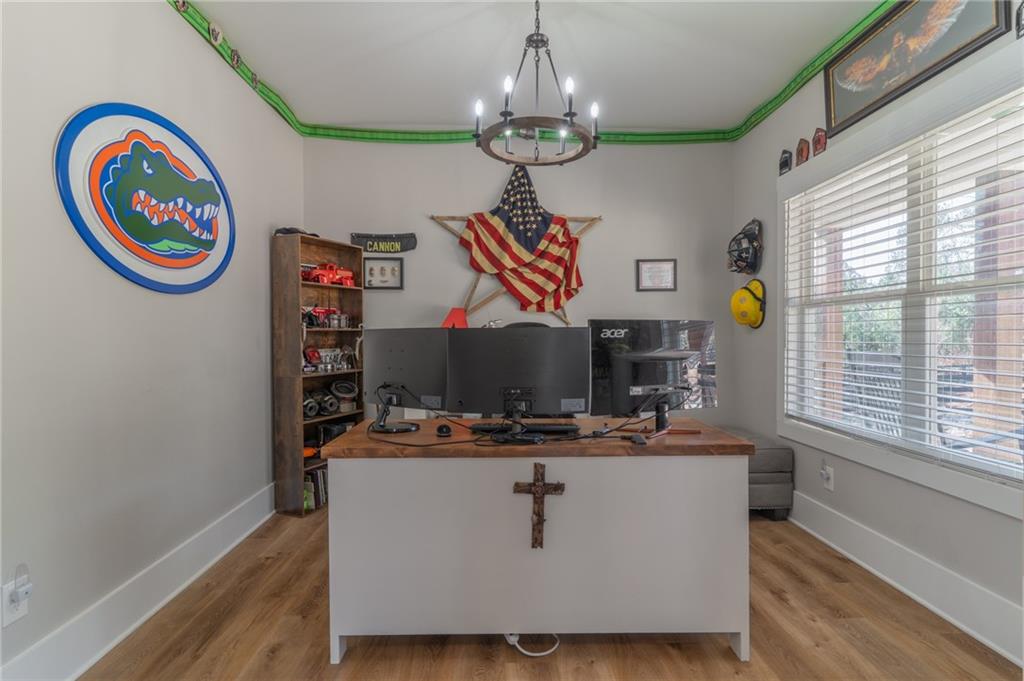 2250 Sperin Road Ball Ground, GA 30107 - Photo 17 of 56 a room with table and a large window