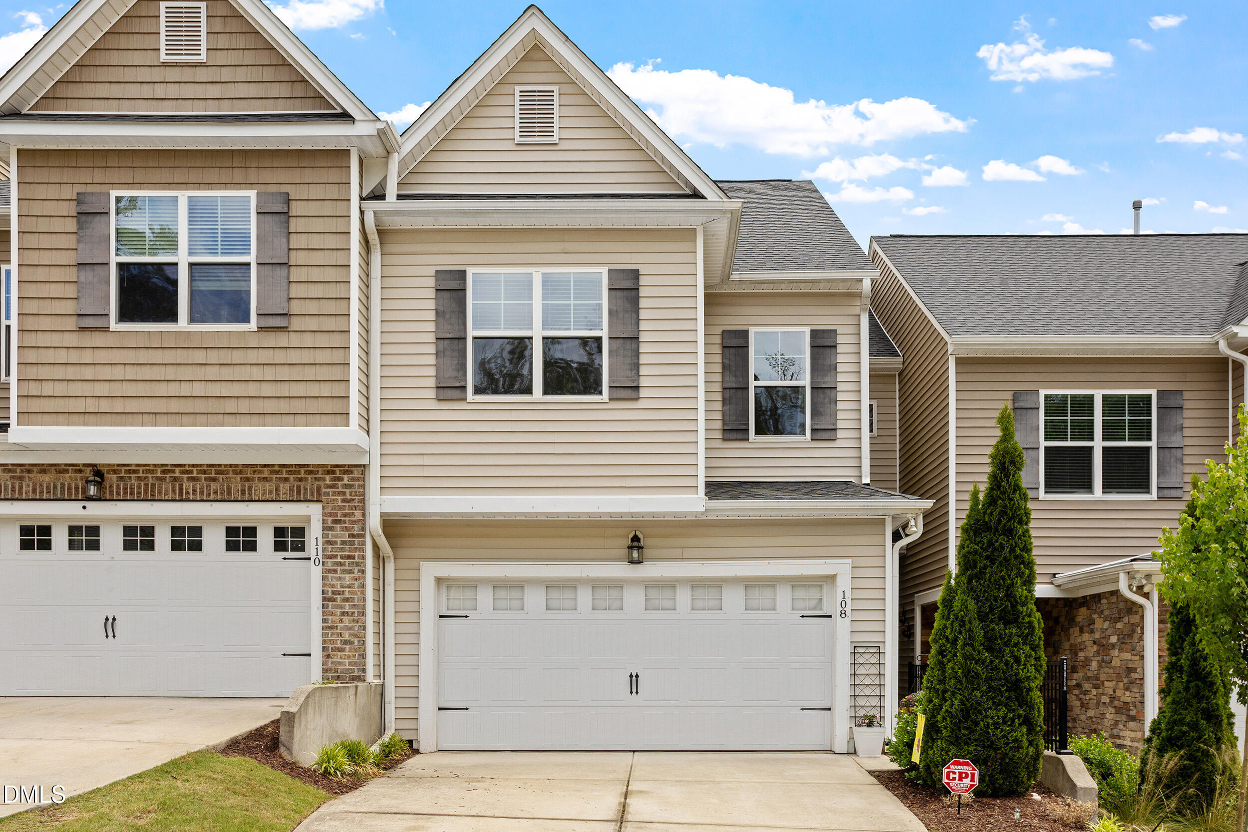 108 Zante Currant Road Durham, NC 27703 - Photo 1 of 33 a view of a house with a garage