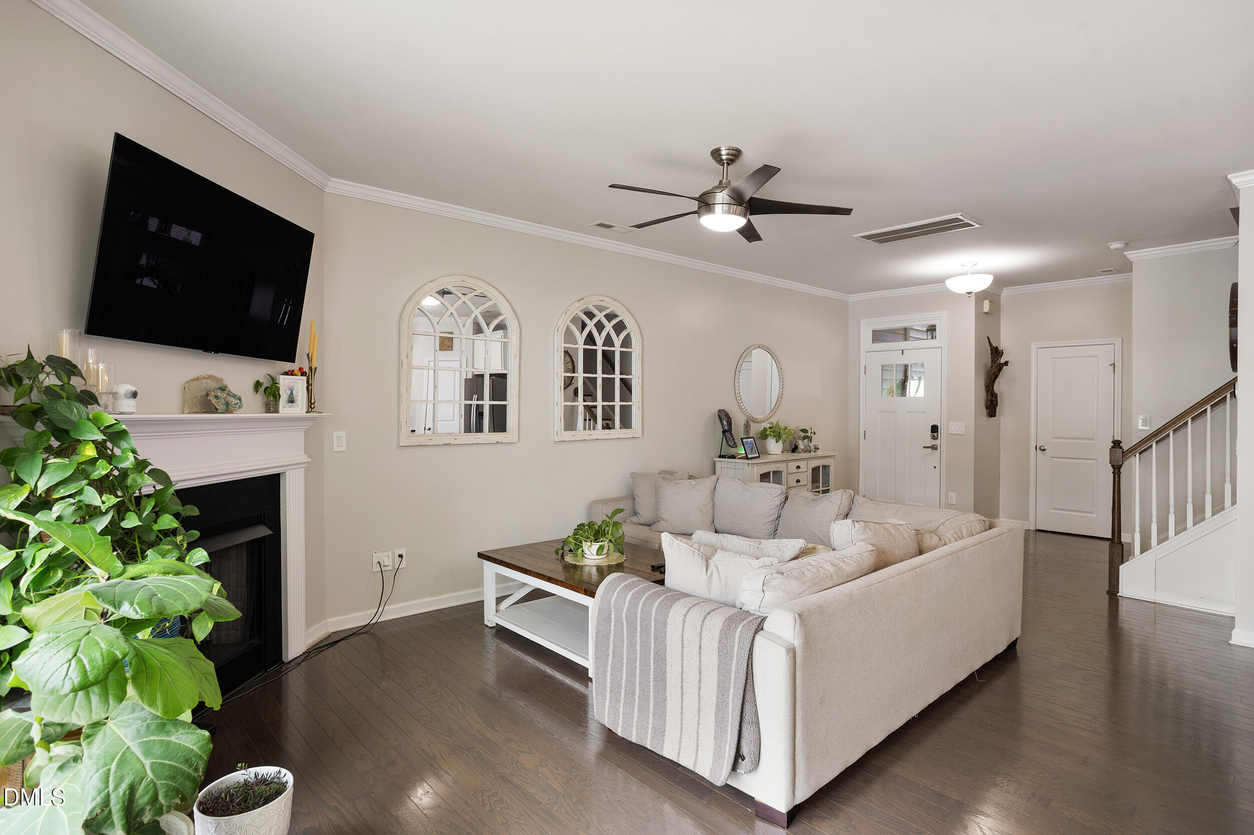 108 Zante Currant Road Durham, NC 27703 - Photo 12 of 33 a living room with furniture and a flat screen tv
