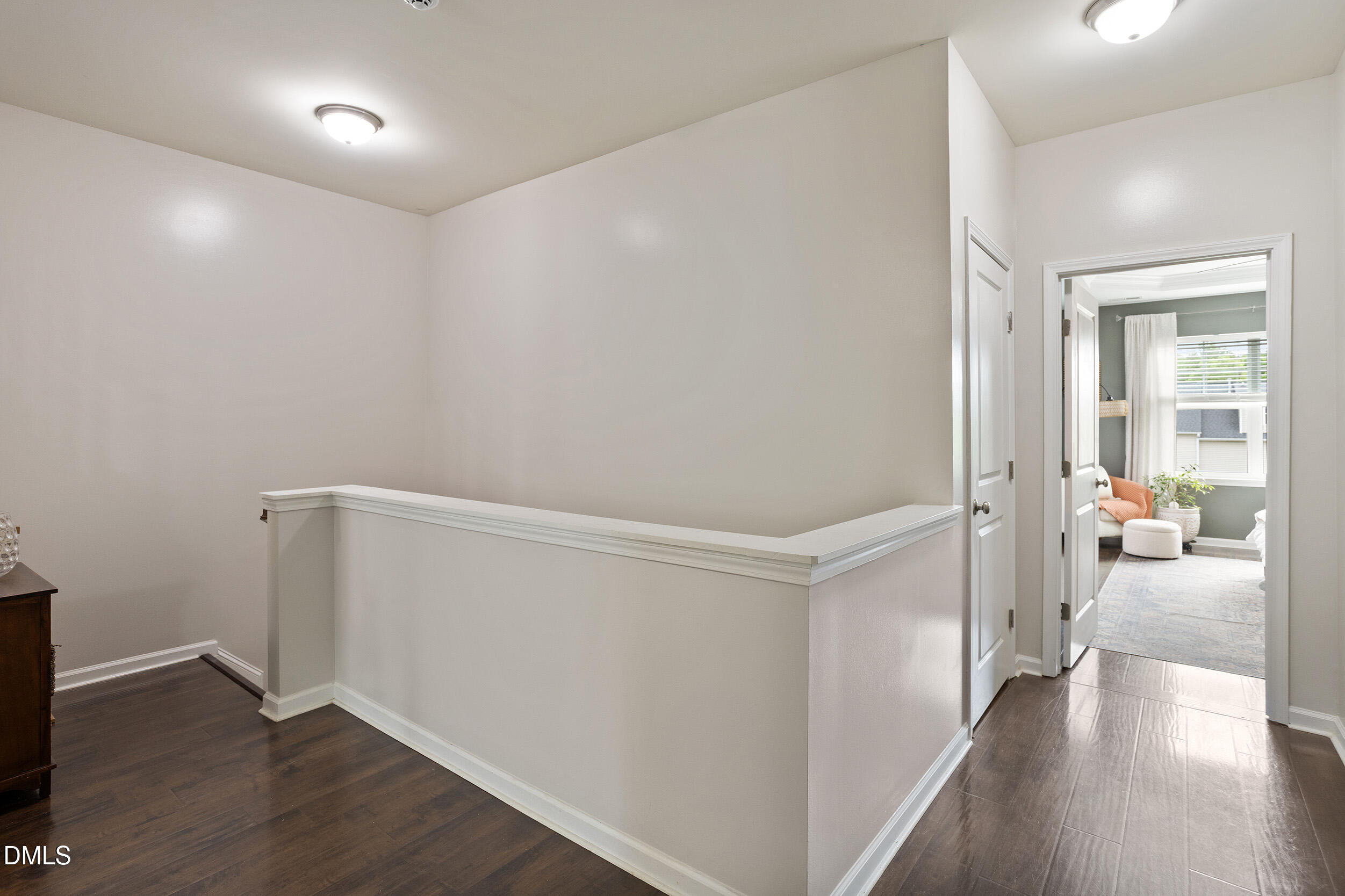 108 Zante Currant Road Durham, NC 27703 - Photo 22 of 33 wooden floor in an empty room with a window