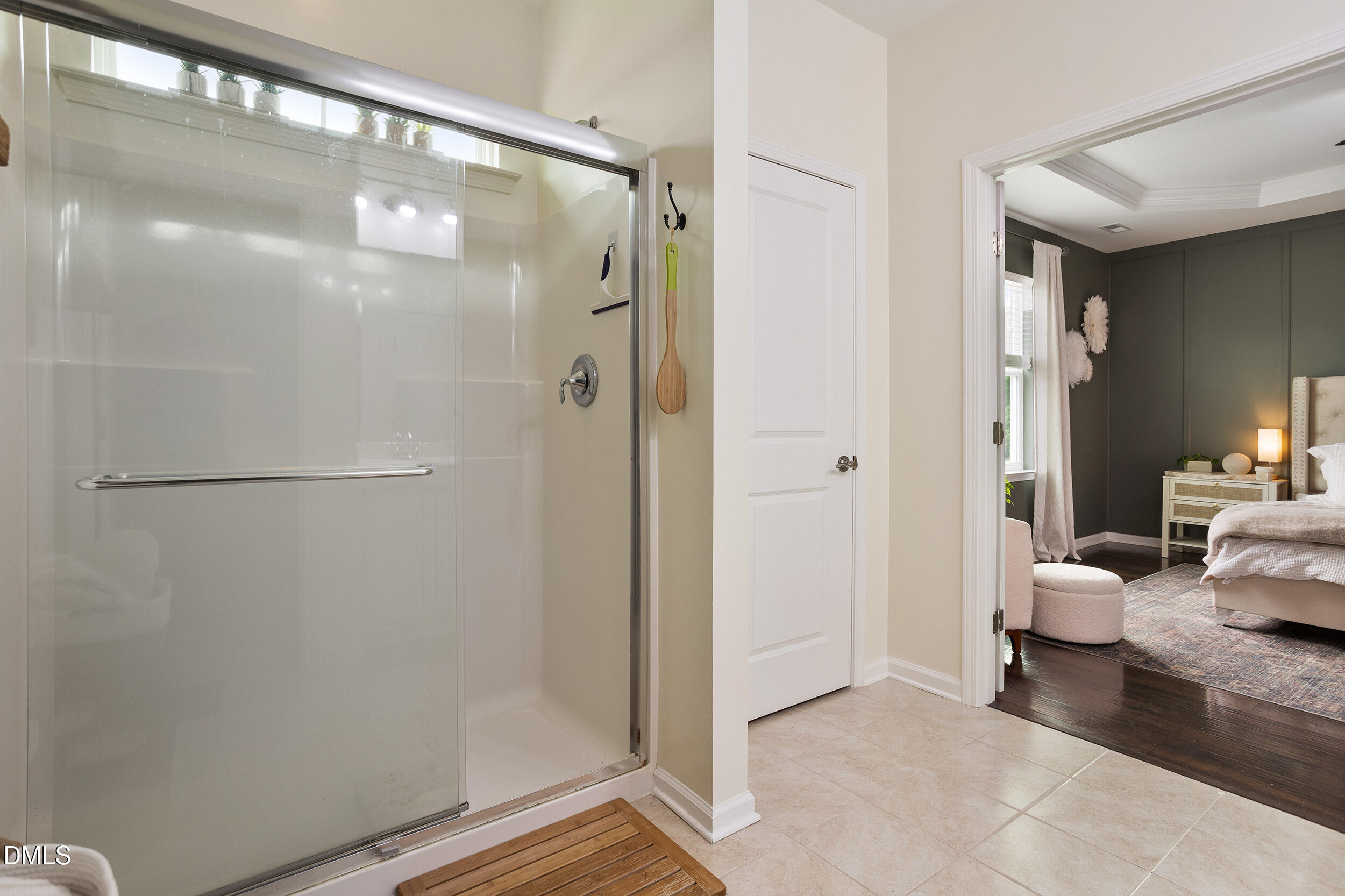 108 Zante Currant Road Durham, NC 27703 - Photo 26 of 33 a bathroom with a shower and a mirror