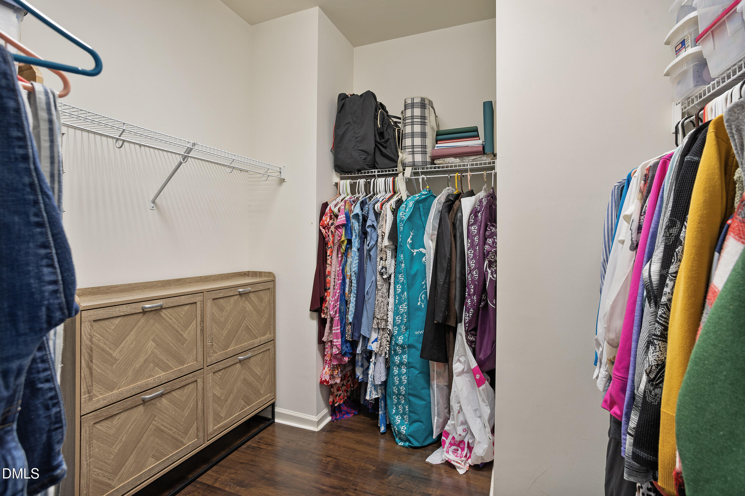 108 Zante Currant Road Durham, NC 27703 - Photo 27 of 33 a view of walk in closet with clothes