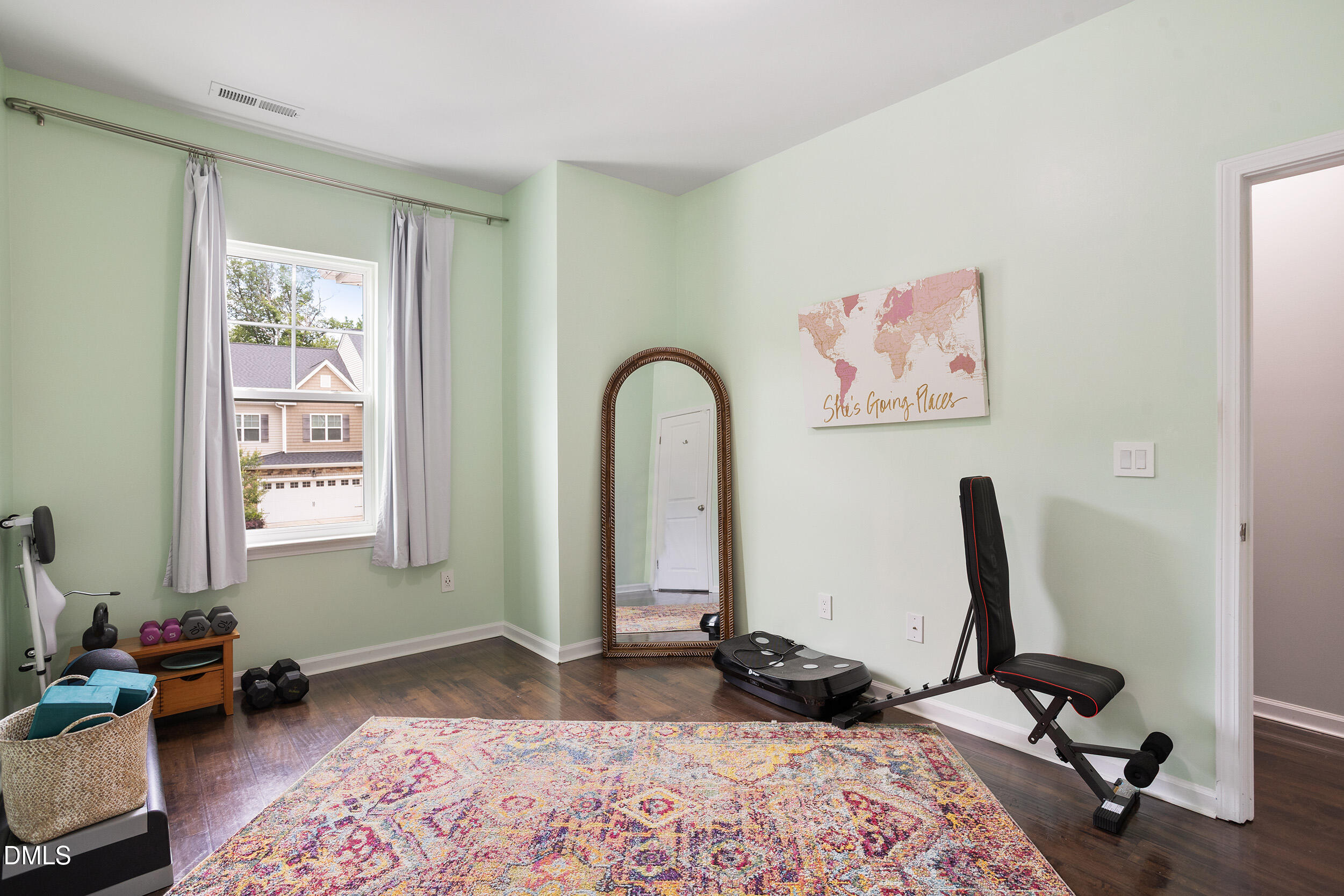 108 Zante Currant Road Durham, NC 27703 - Photo 32 of 33 a bedroom with a bed and a window
