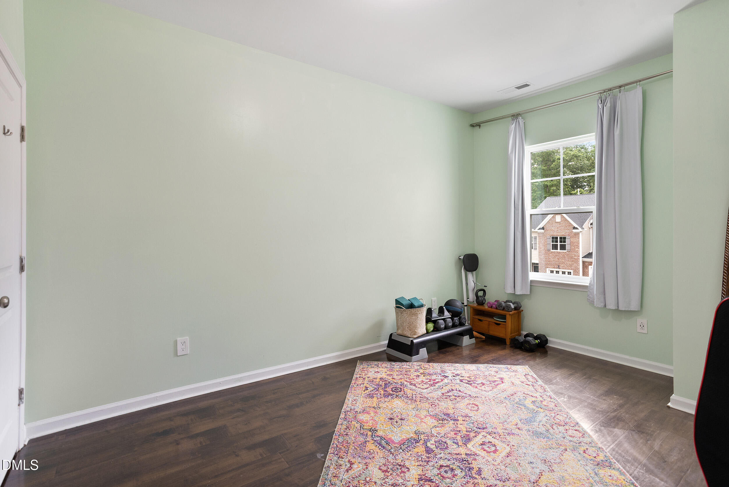 108 Zante Currant Road Durham, NC 27703 - Photo 33 of 33 a bed room with a bed and a window