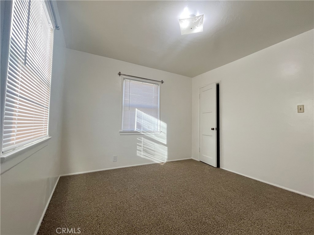 911 Park Avenue Calimesa, CA 92320 - Photo 11 of 19 an empty room with windows