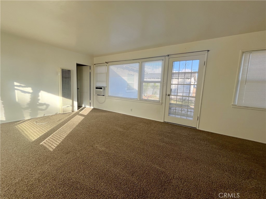 911 Park Avenue Calimesa, CA 92320 - Photo 6 of 19 a view of an empty room with a window