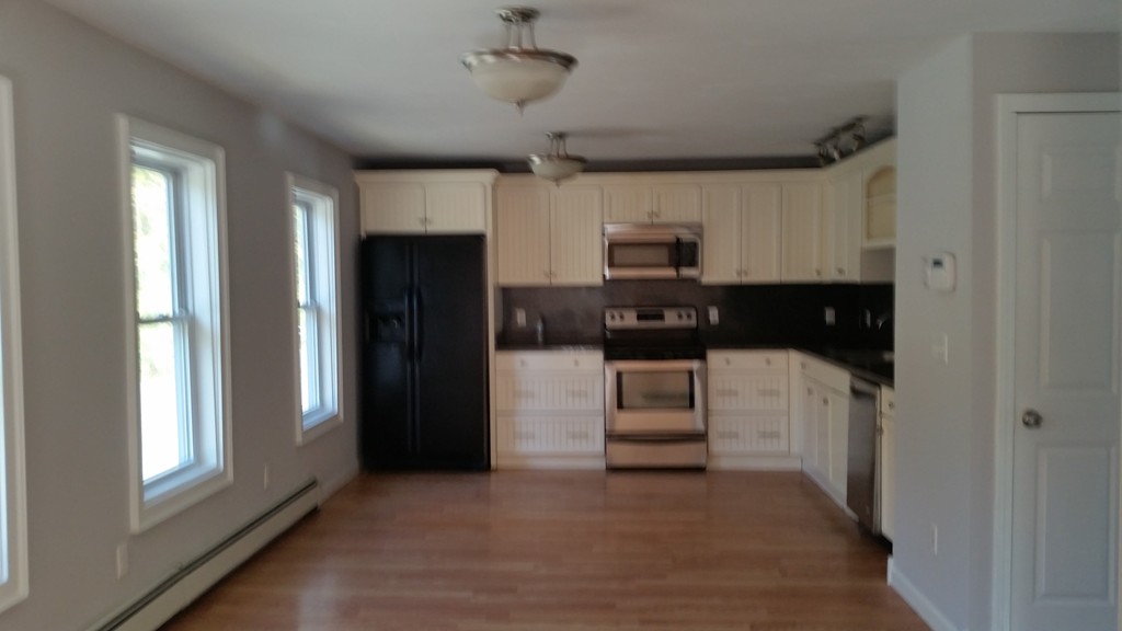 423 Putnam Hill Road Sutton, MA 01590 - Photo 7 of 12 a view of kitchen with sink and refrigerator
