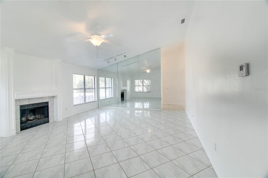 3107 Ash Park Loop Winter Park, FL 32792 - Photo 2 of 11 a view of a livingroom with a fireplace