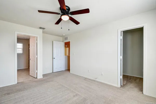 a bathroom with a sink double vanity and a toilet