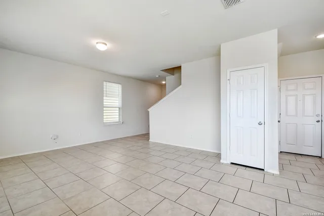 an empty room with windows