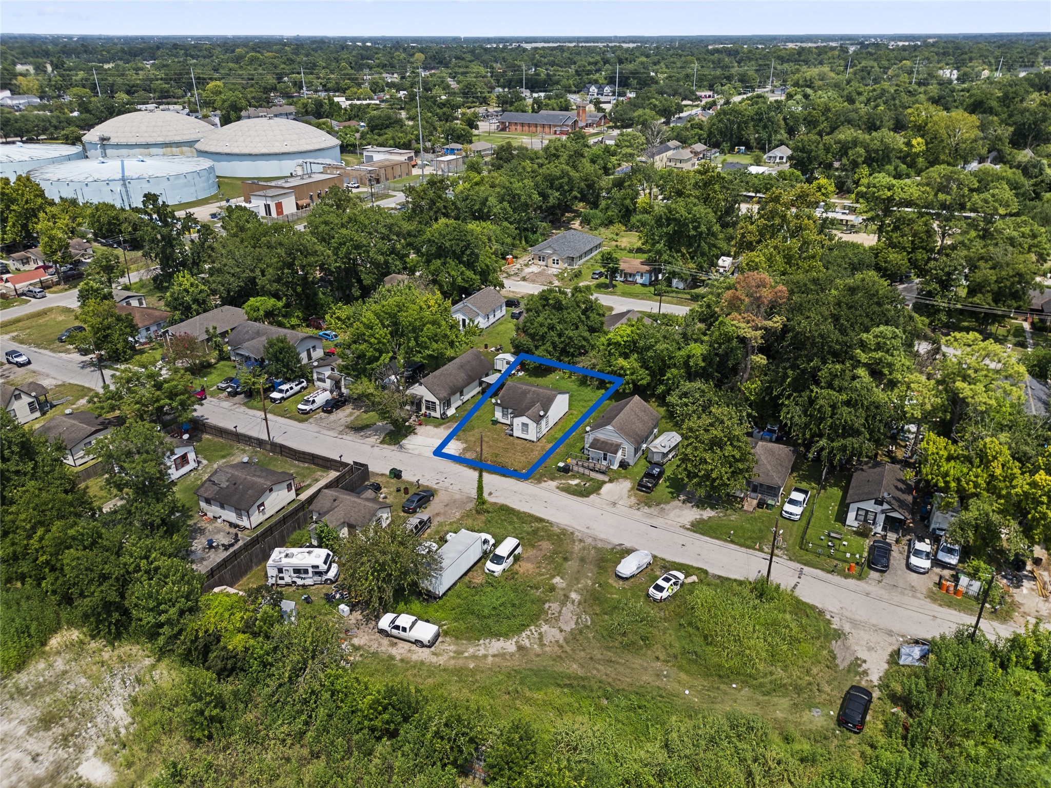7328 Parkes Street Houston, TX 77088 - Photo 2 of 12 an aerial view of a residential houses with outdoor space and trees