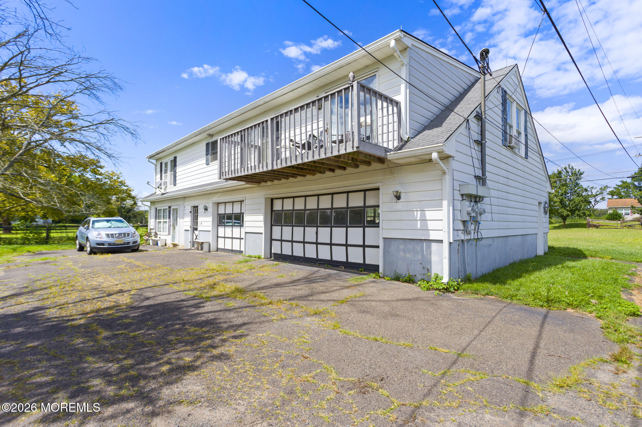 16 Archertown Road, Unit B New Egypt, NJ 08533 - Photo 1 of 7 a front view of a house with a garden and deck