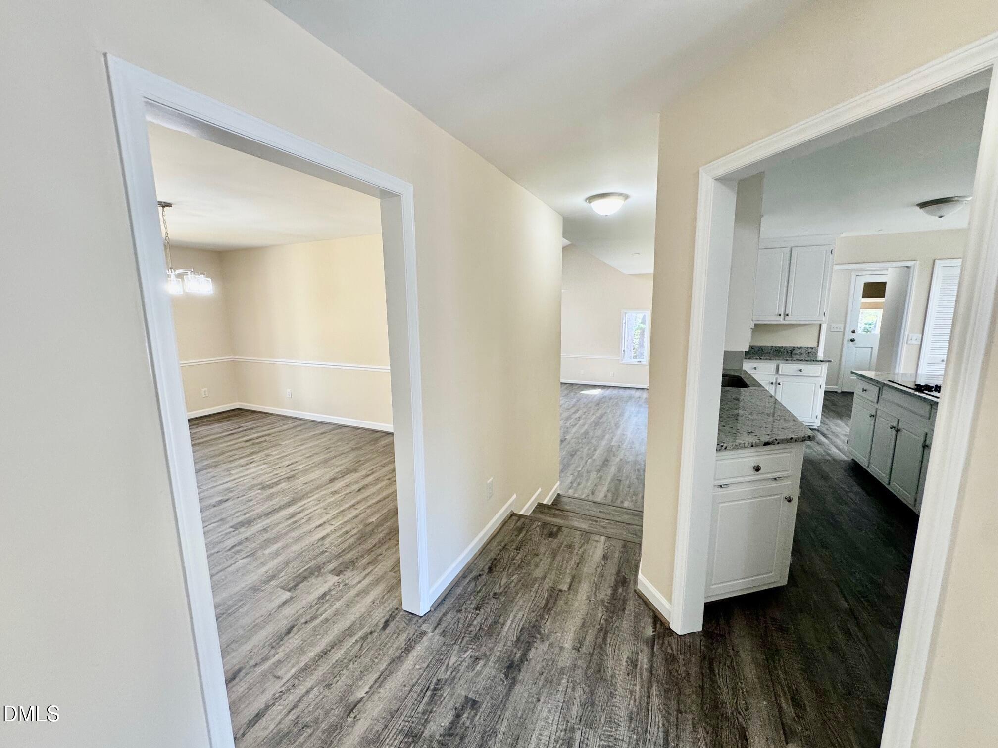 1720 Ross Mill Road Henderson, NC 27537 - Photo 10 of 42 a view of a kitchen from the hallway