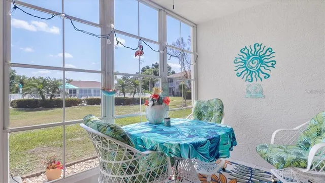a view of a table and chairs in patio