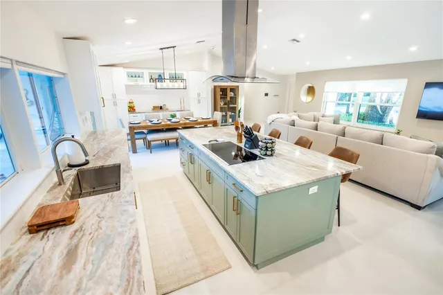 a living room with furniture and a table