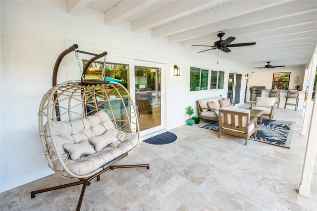 a kitchen with a stove a sink and a refrigerator