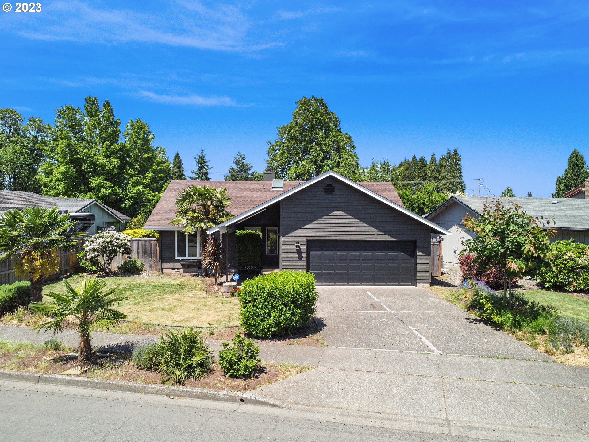 front view of a house with a yard