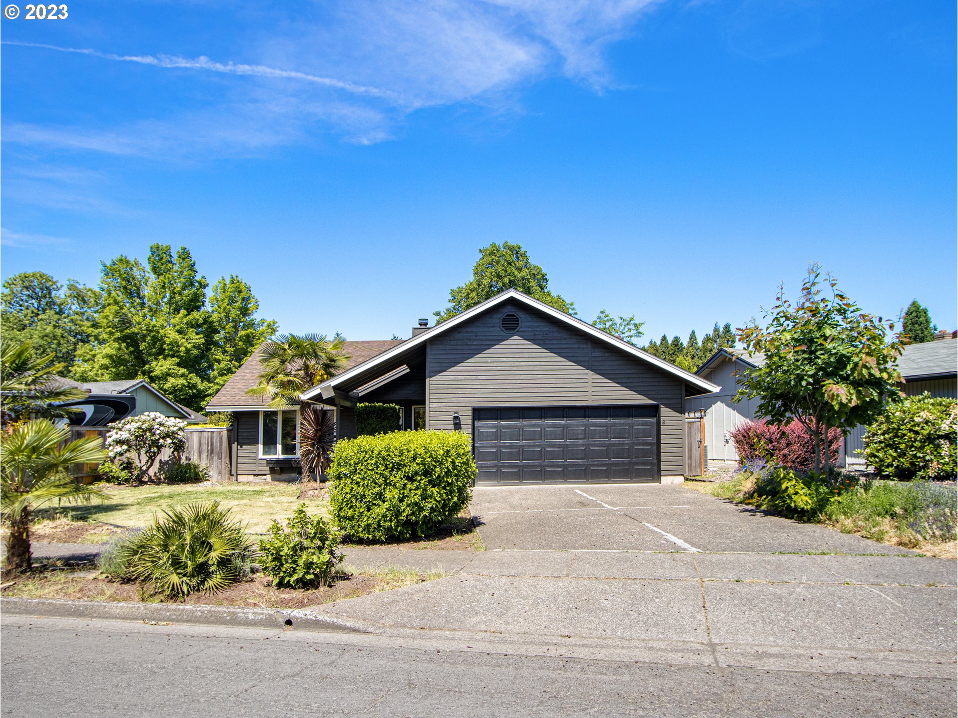 2883 Elysium Avenue Eugene, OR 97401 - Photo 2 of 21 front view of a house with a street