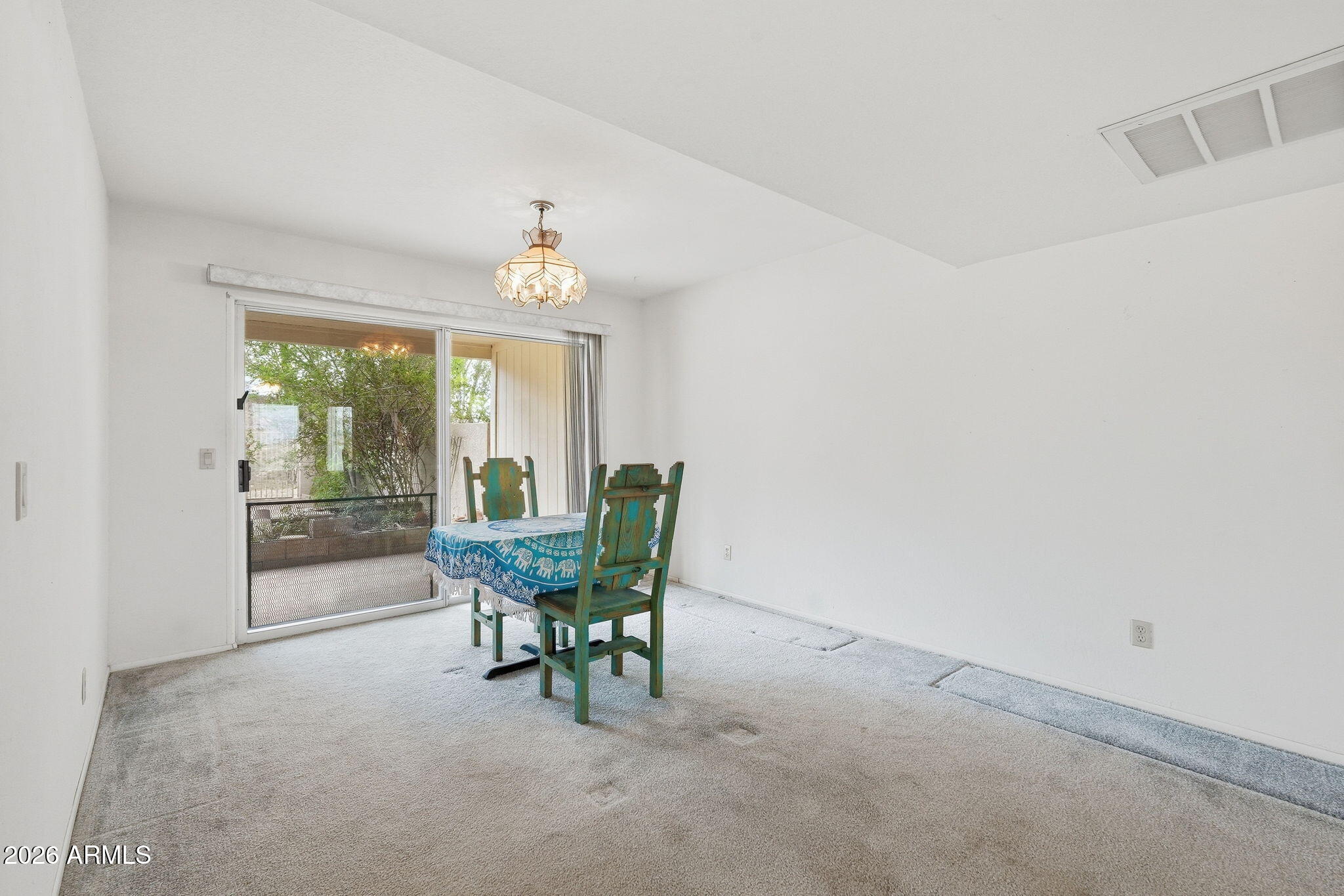 428 Camino Canoa Rio Rico, AZ 85648 - Photo 18 of 56 a view of a dining room with furniture window and outside view
