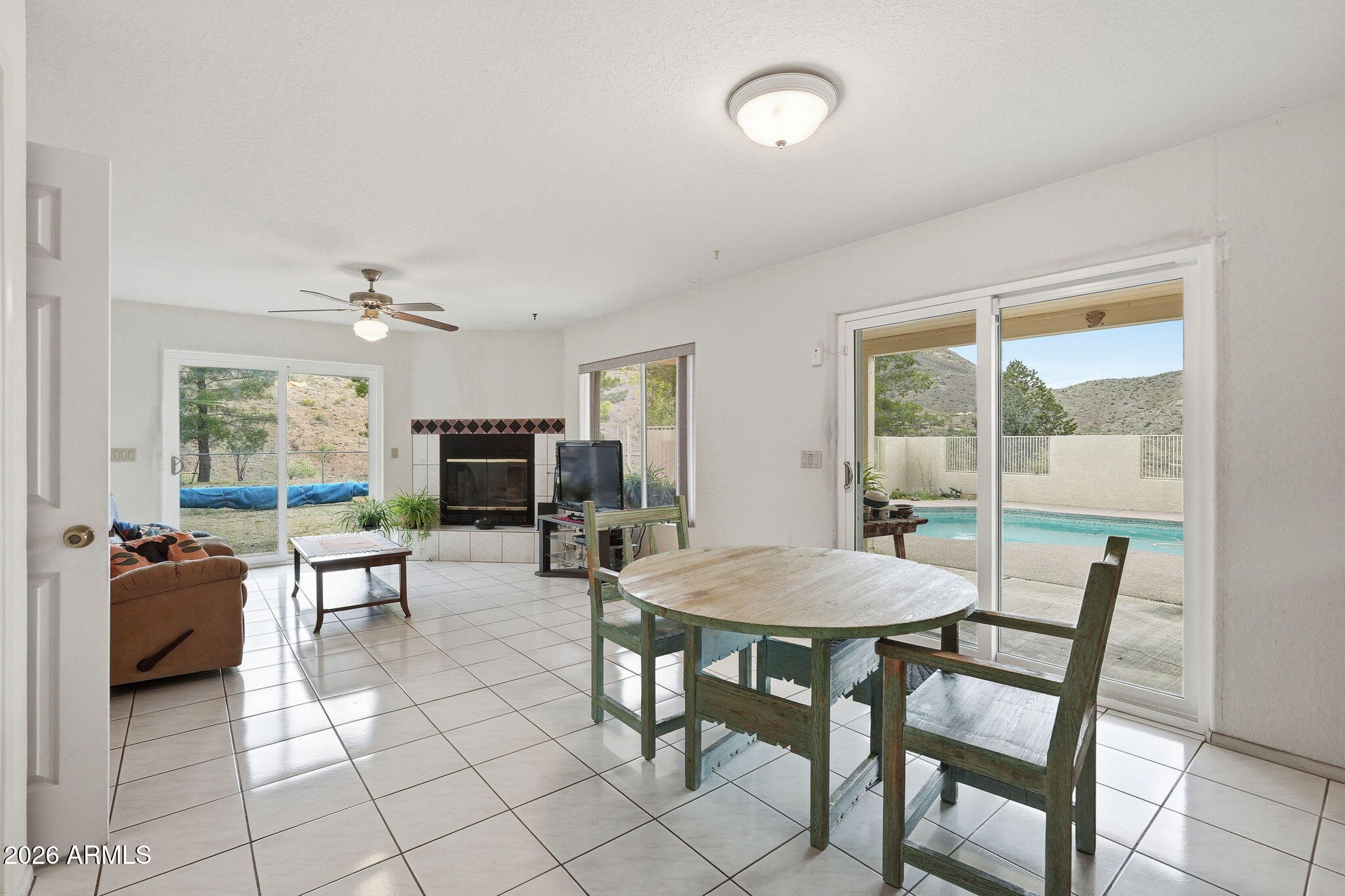 428 Camino Canoa Rio Rico, AZ 85648 - Photo 19 of 56 a view of a dining room with furniture and a window