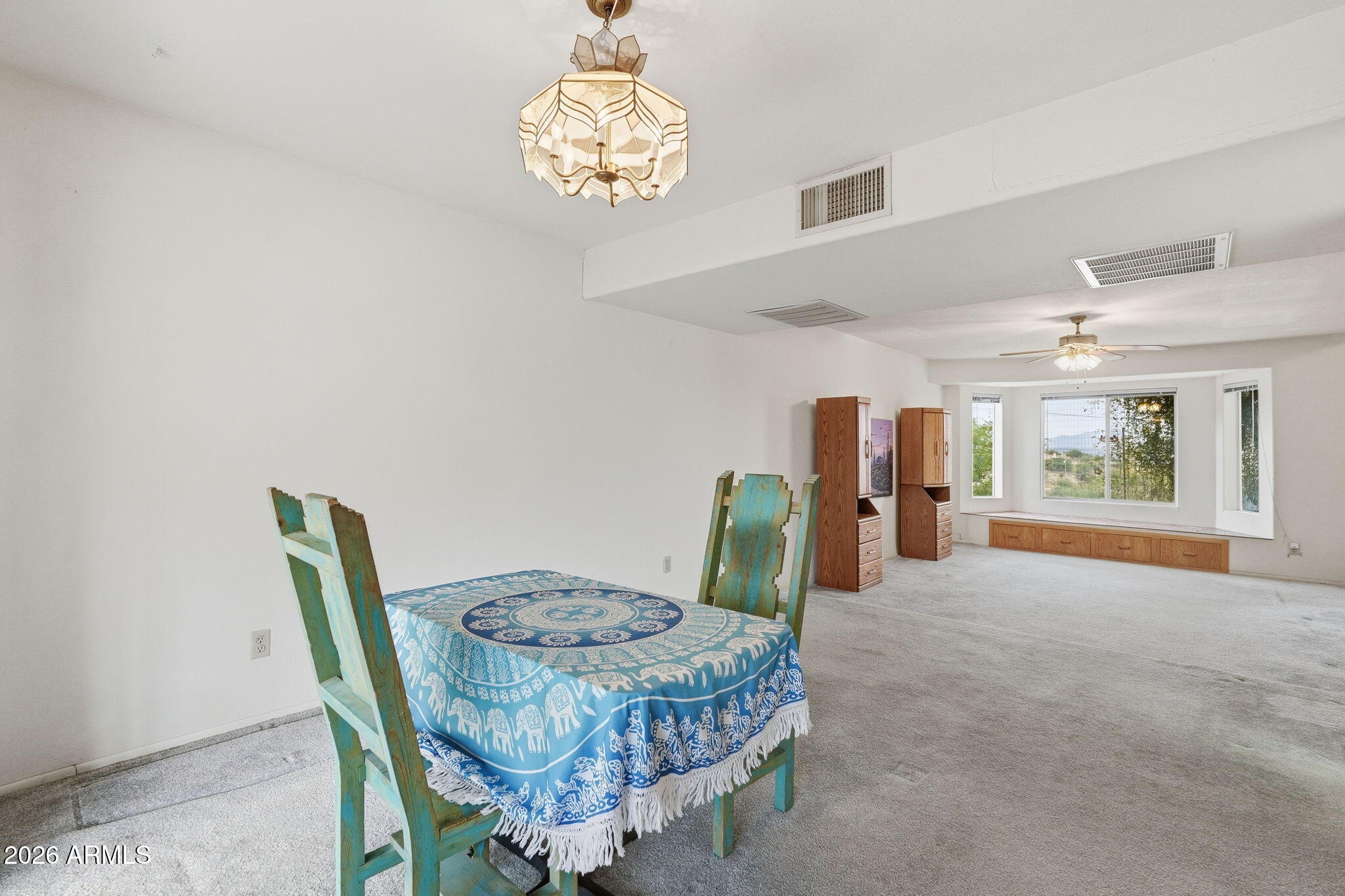 428 Camino Canoa Rio Rico, AZ 85648 - Photo 20 of 56 a view of a dining room with furniture window and outside view