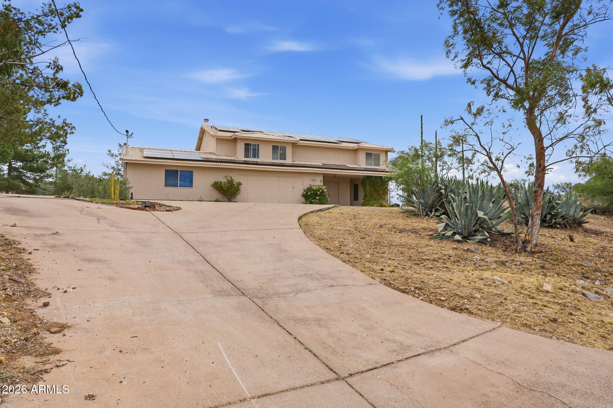 428 Camino Canoa Rio Rico, AZ 85648 - Photo 2 of 56 a view of a house with a trees