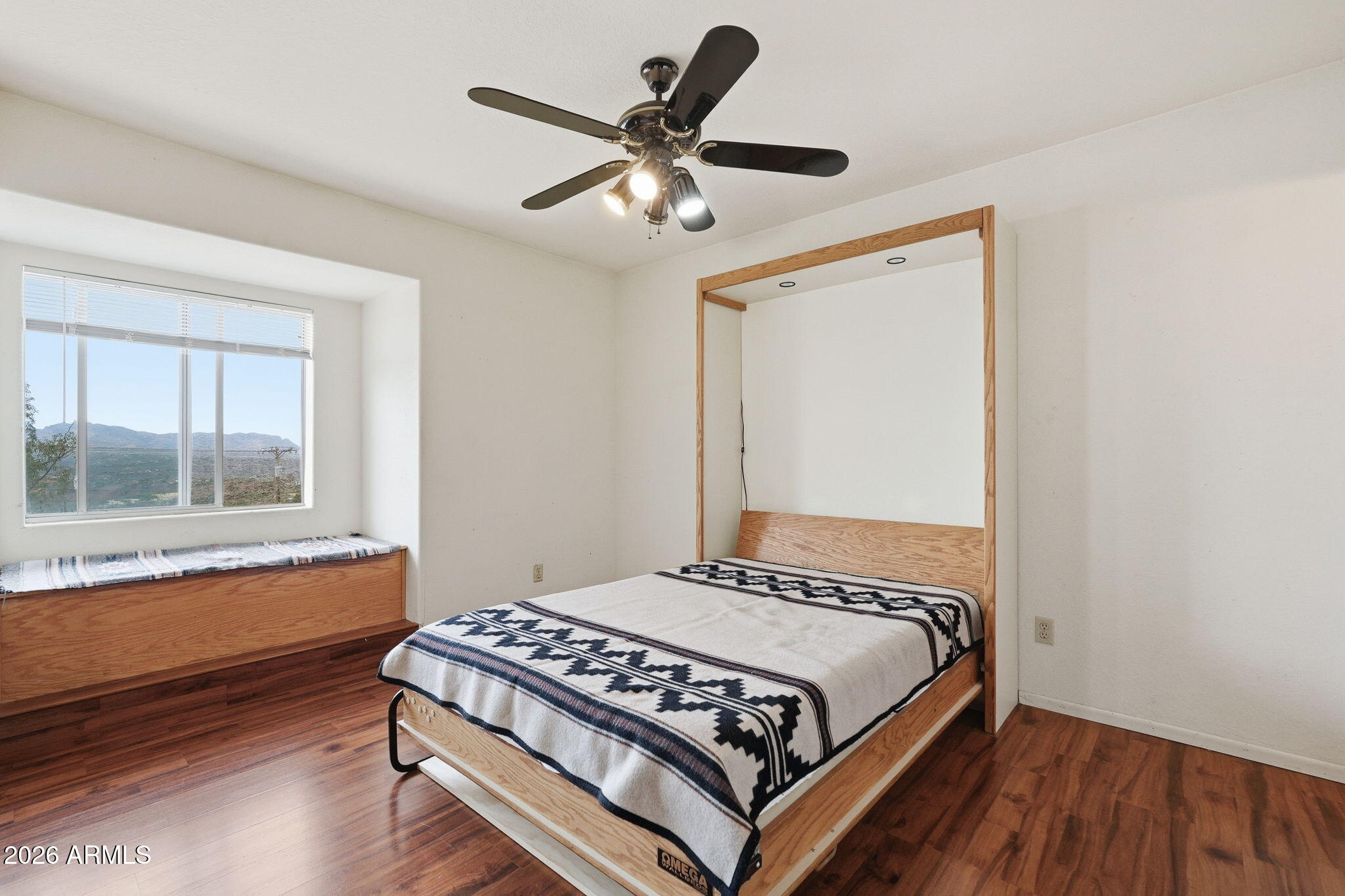 428 Camino Canoa Rio Rico, AZ 85648 - Photo 33 of 56 a bedroom with a bed and window