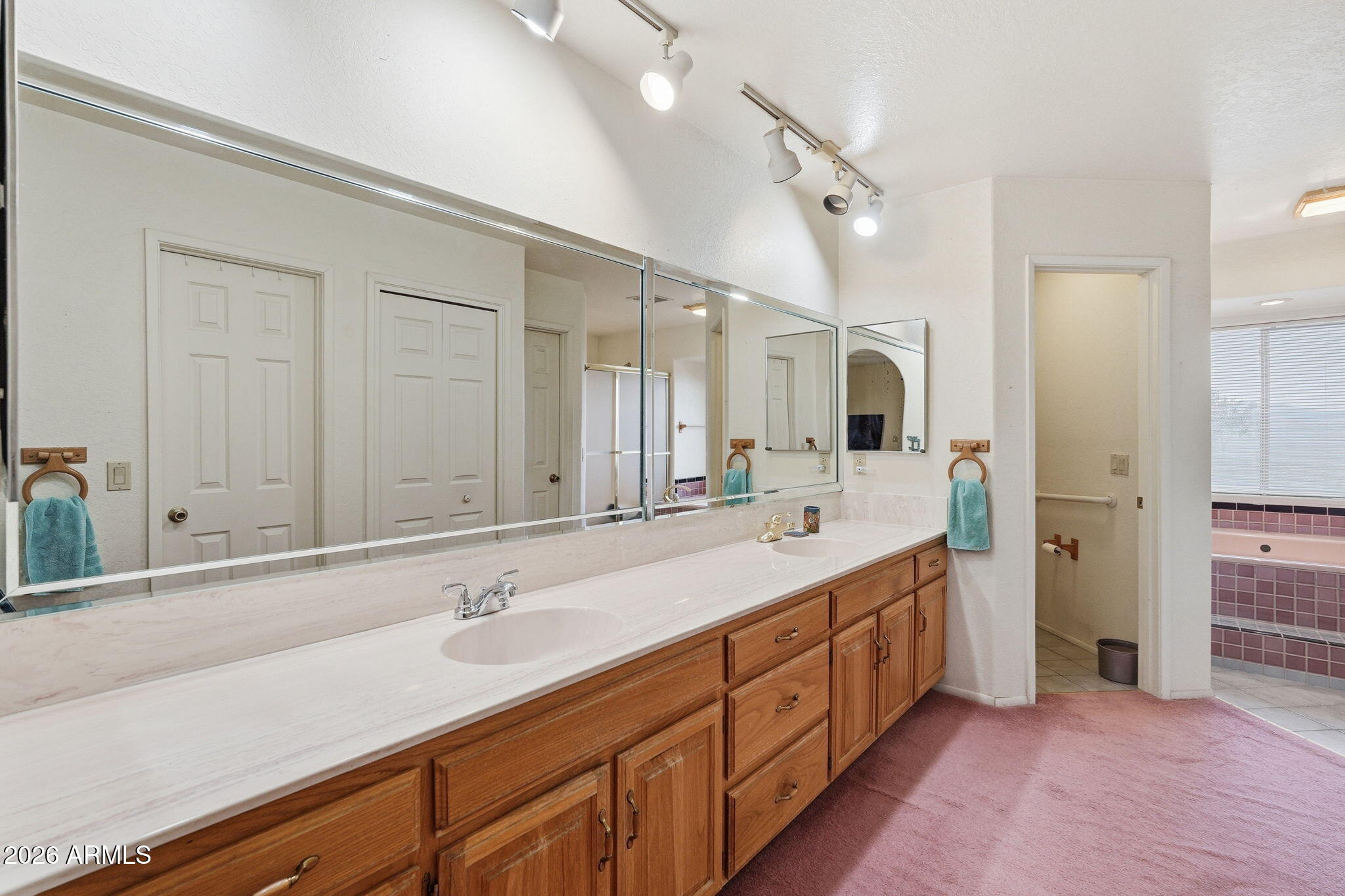 428 Camino Canoa Rio Rico, AZ 85648 - Photo 36 of 56 a spacious bathroom with a double vanity sink double and mirror