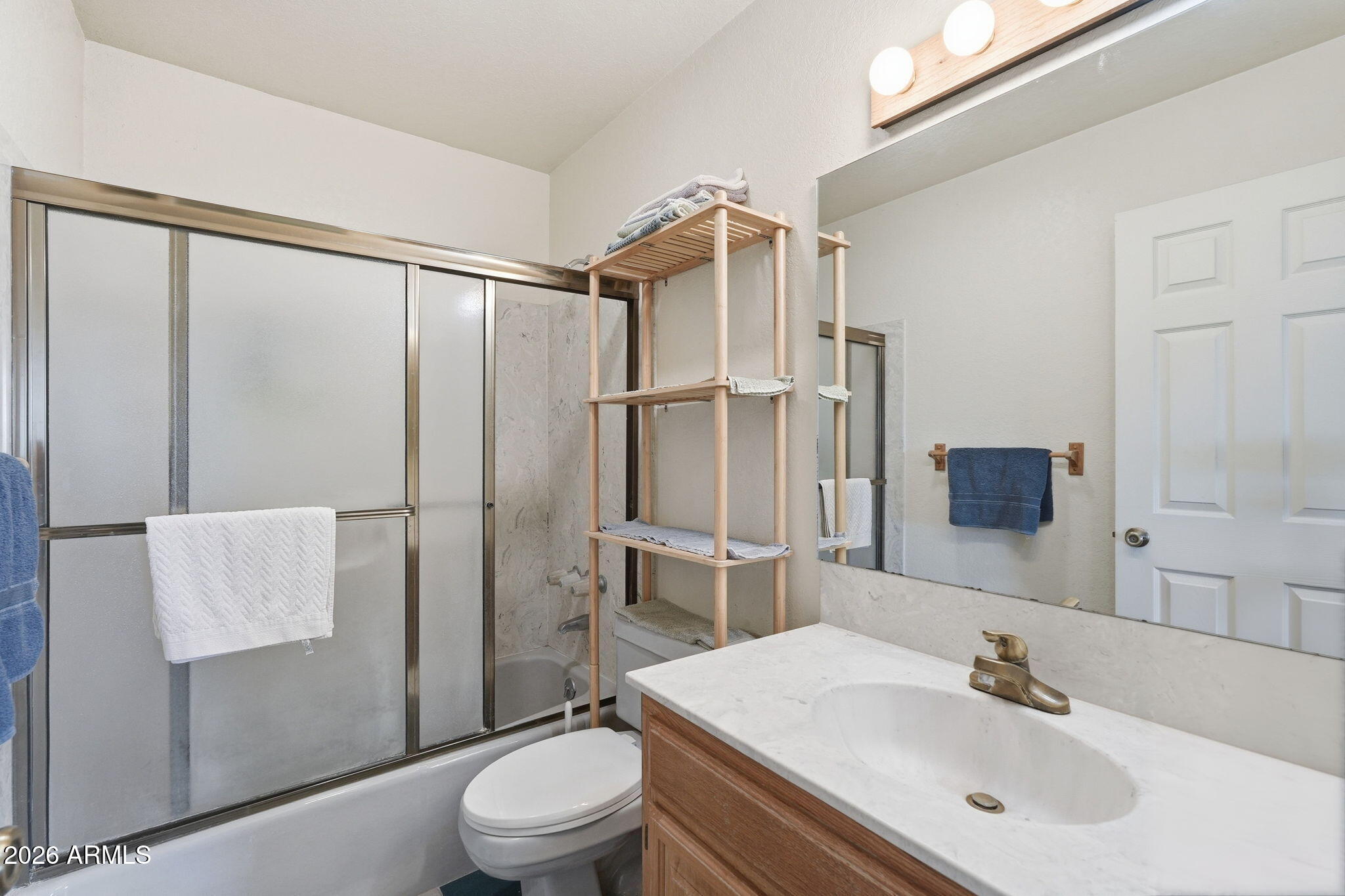 428 Camino Canoa Rio Rico, AZ 85648 - Photo 38 of 56 a bathroom with a sink toilet and shower
