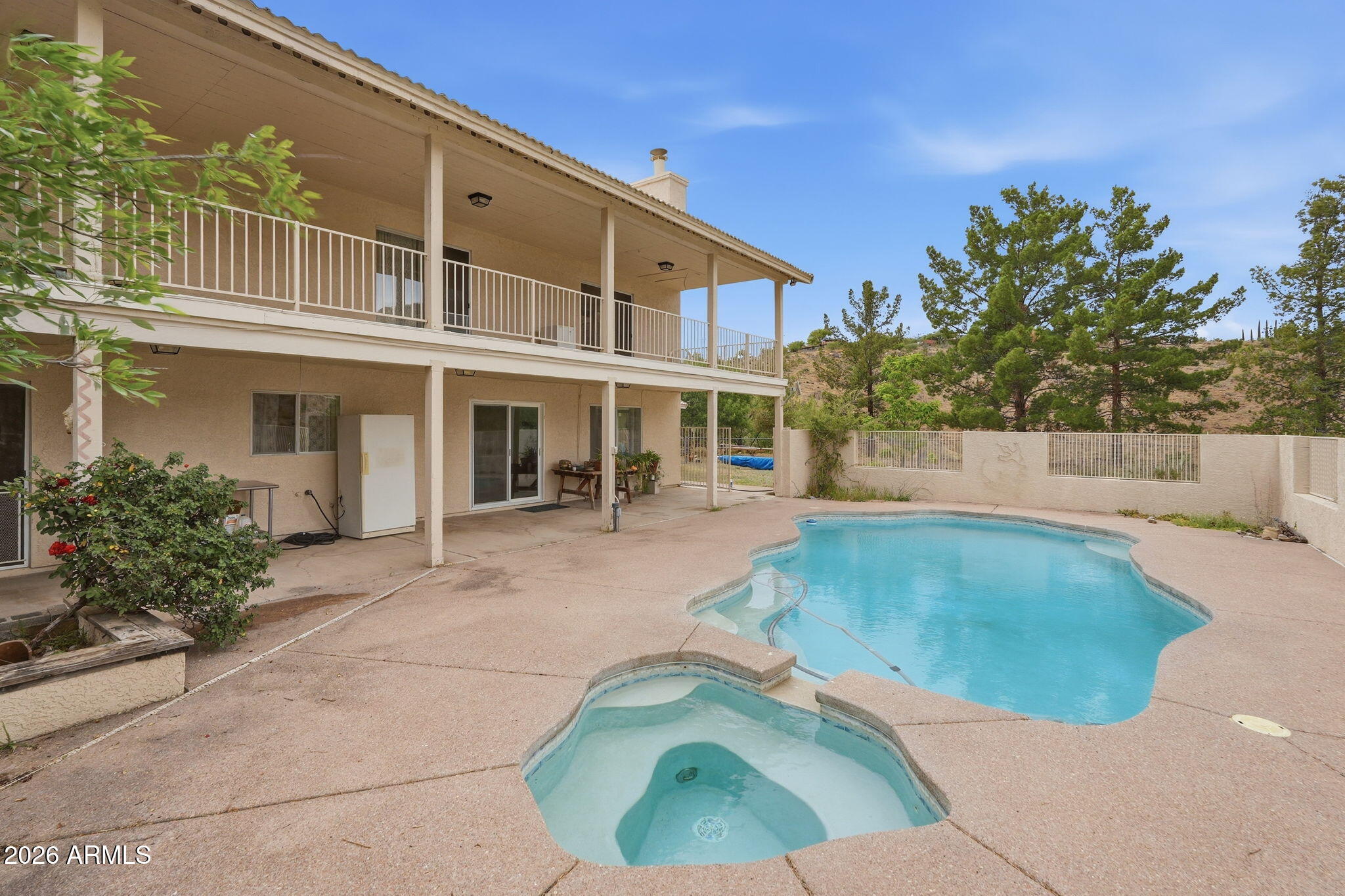 428 Camino Canoa Rio Rico, AZ 85648 - Photo 40 of 56 front view of a house with a garden
