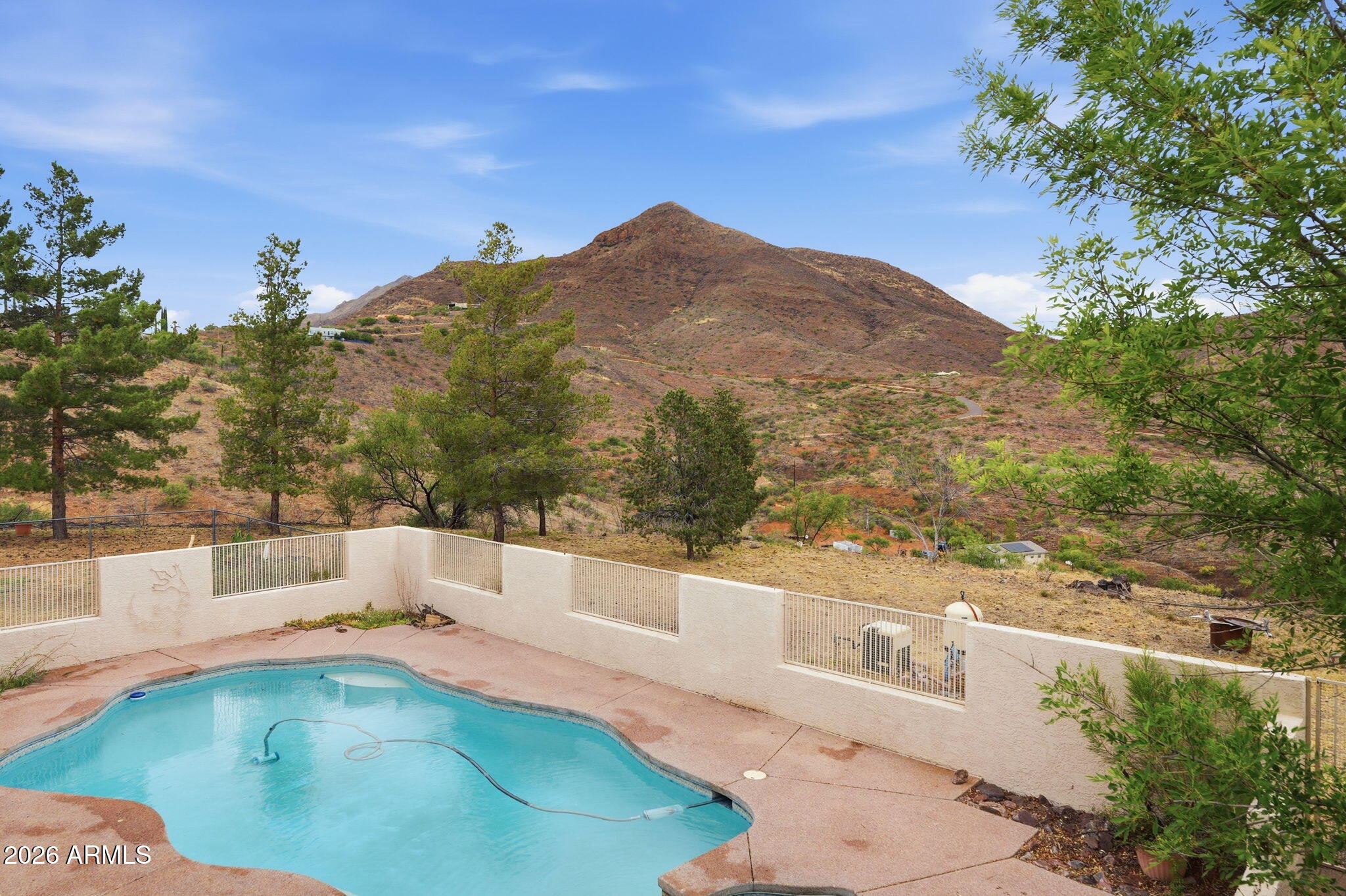 428 Camino Canoa Rio Rico, AZ 85648 - Photo 43 of 56 a view of a swimming pool with an outdoor seating