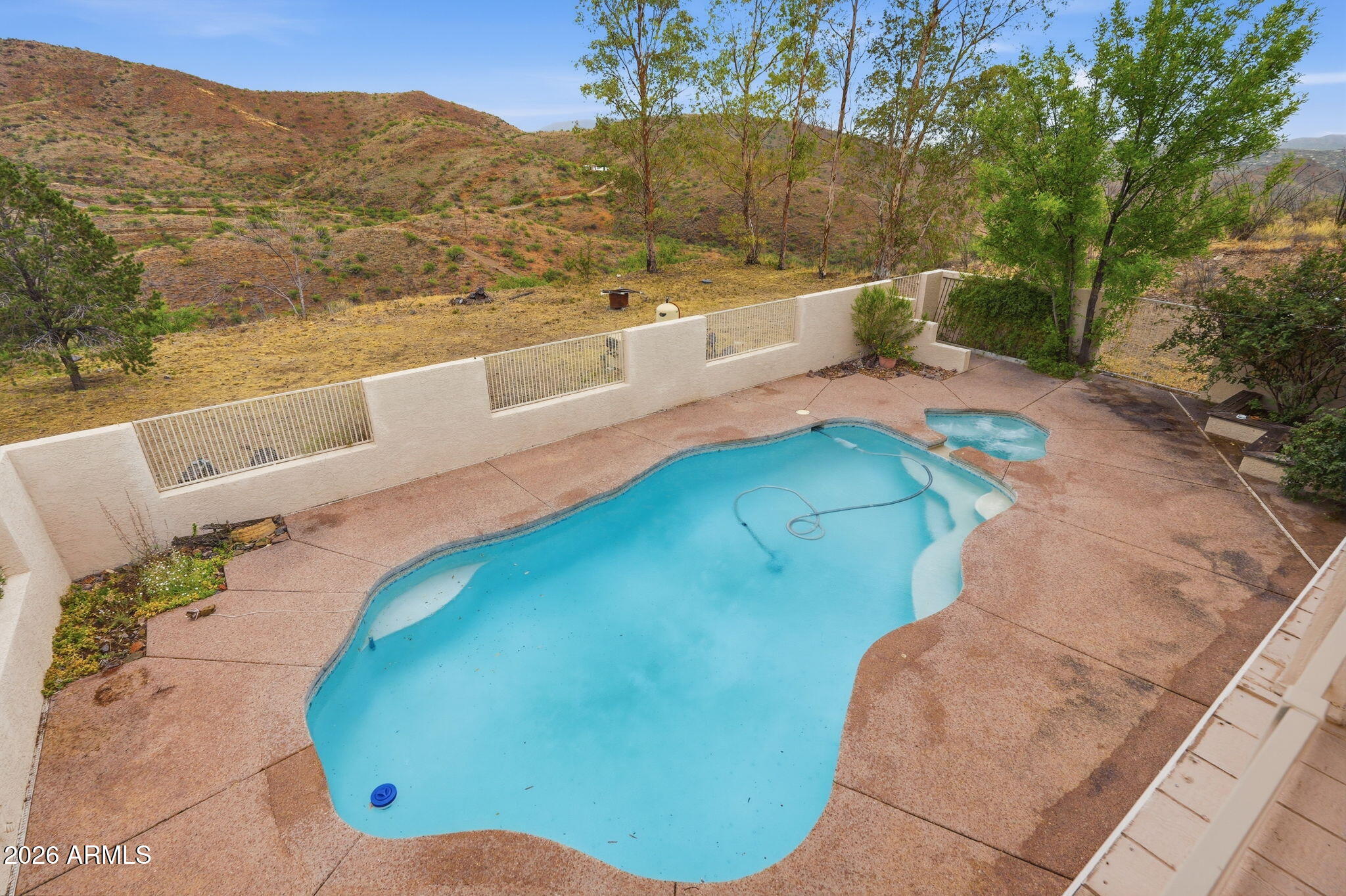 428 Camino Canoa Rio Rico, AZ 85648 - Photo 45 of 56 a view of a swimming pool with a yard