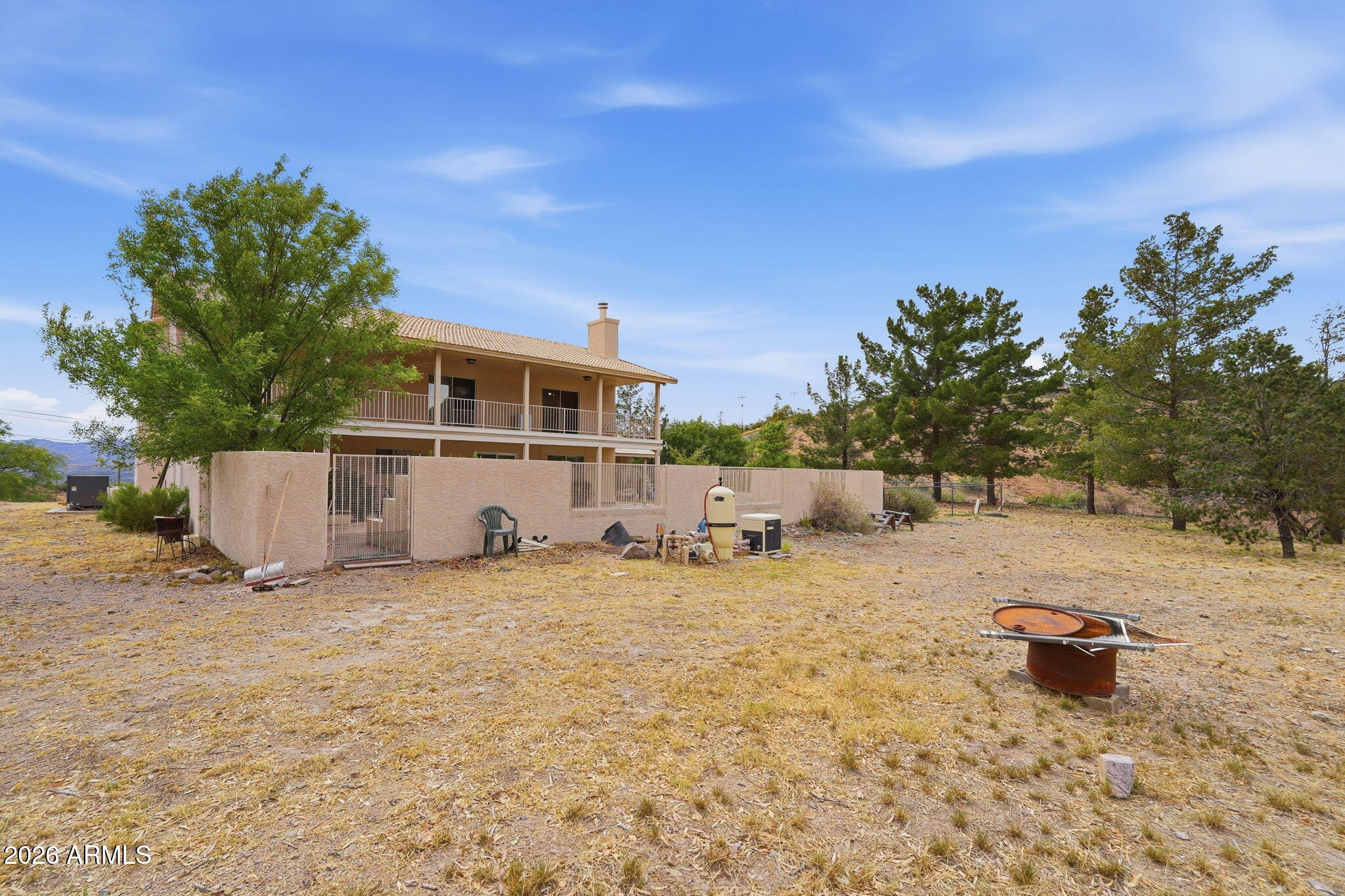 428 Camino Canoa Rio Rico, AZ 85648 - Photo 46 of 56 a backyard of a house with table and chairs