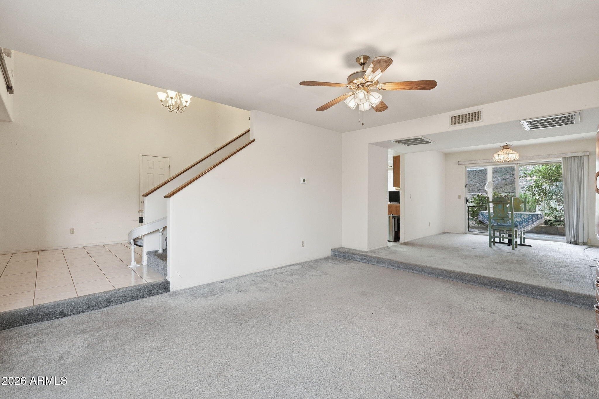 428 Camino Canoa Rio Rico, AZ 85648 - Photo 10 of 56 a view of a livingroom with a ceiling fan and window