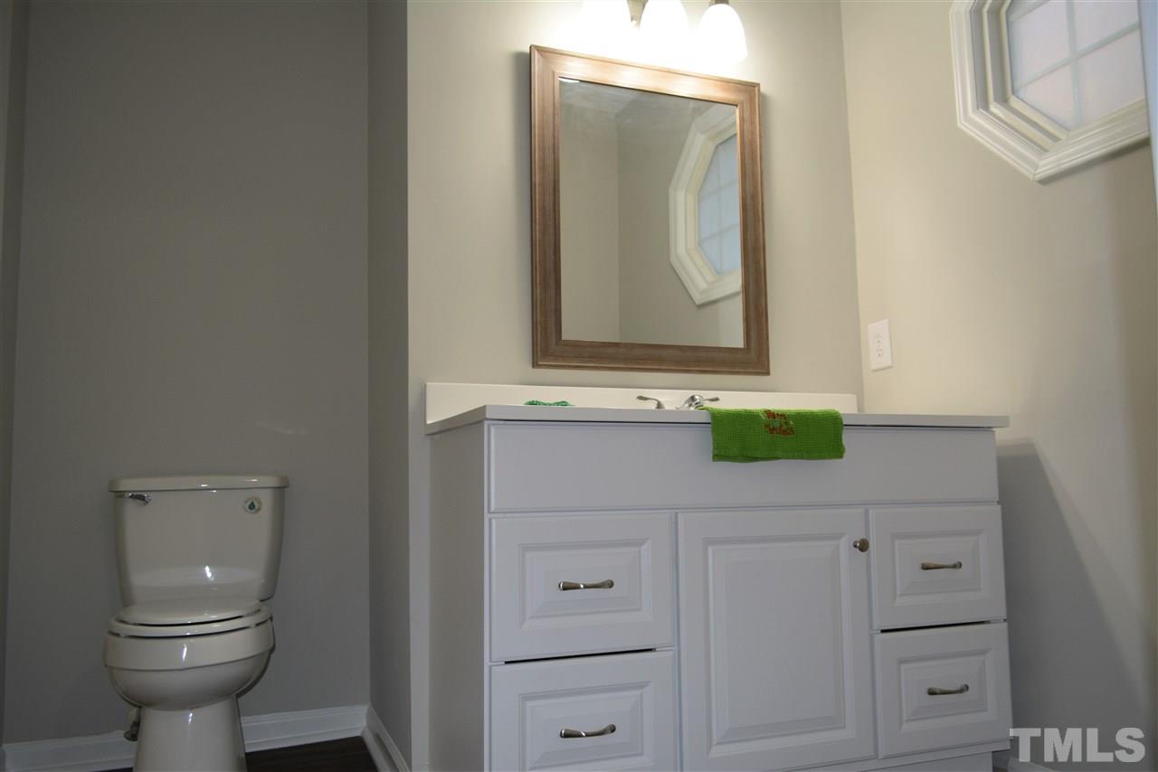 1603 Friendly Road Dunn, NC 28334 - Photo 13 of 24 new flooring, new paint, new vanities, new mirrors, new lighting