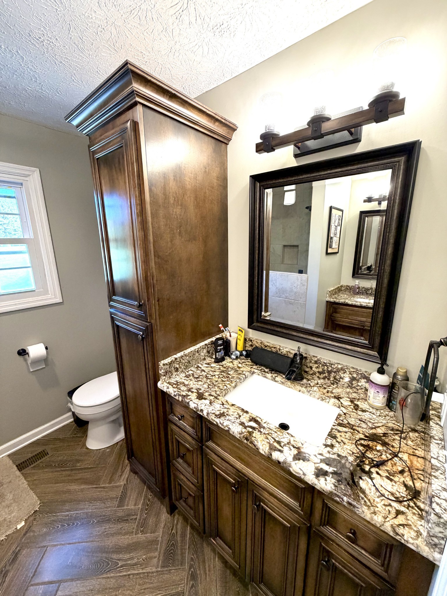 356 Lee Road Cottontown, TN 37048 - Photo 26 of 52 a bathroom with a granite countertop sink and a mirror