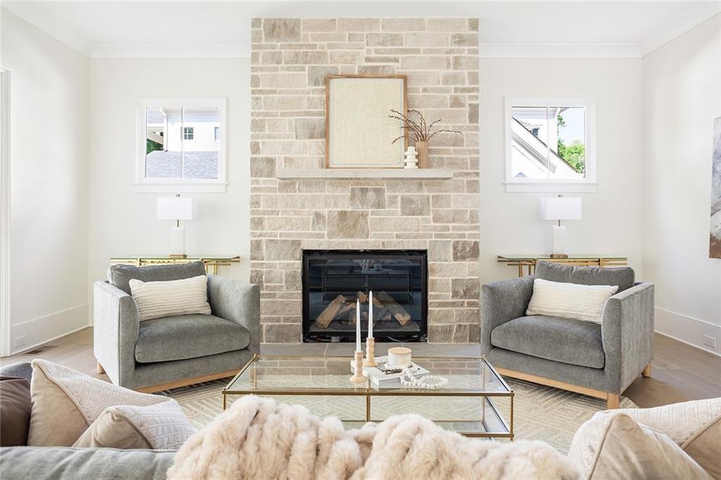 48 25th Atlanta, GA 30328 - Photo 14 of 48 a living room with furniture and a fireplace