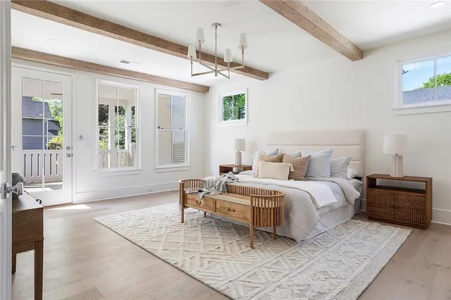 a bedroom with a bed and a table