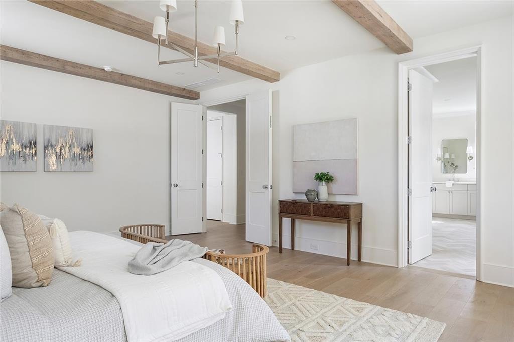 48 25th Atlanta, GA 30328 - Photo 25 of 48 a bedroom with a bed and a table